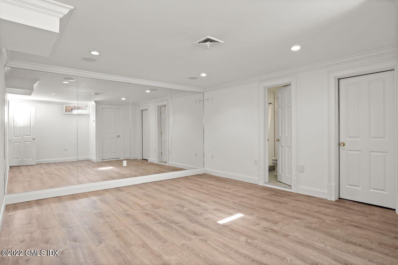56 Frontier Road Cos Cob, CT 06807 - Photo 26 of 32 a view of an empty room