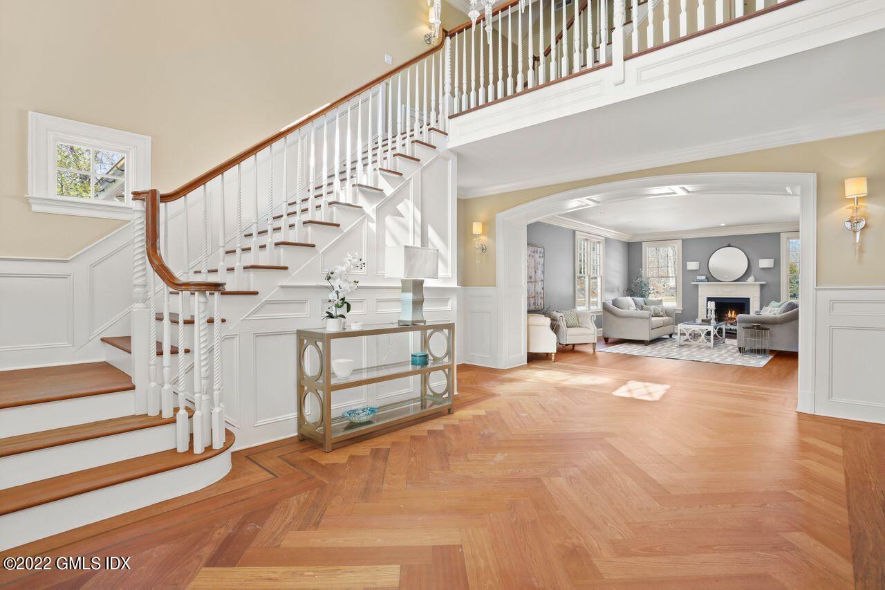 56 Frontier Road Cos Cob, CT 06807 - Photo 4 of 32 a view of entryway livingroom and hall with wooden floor