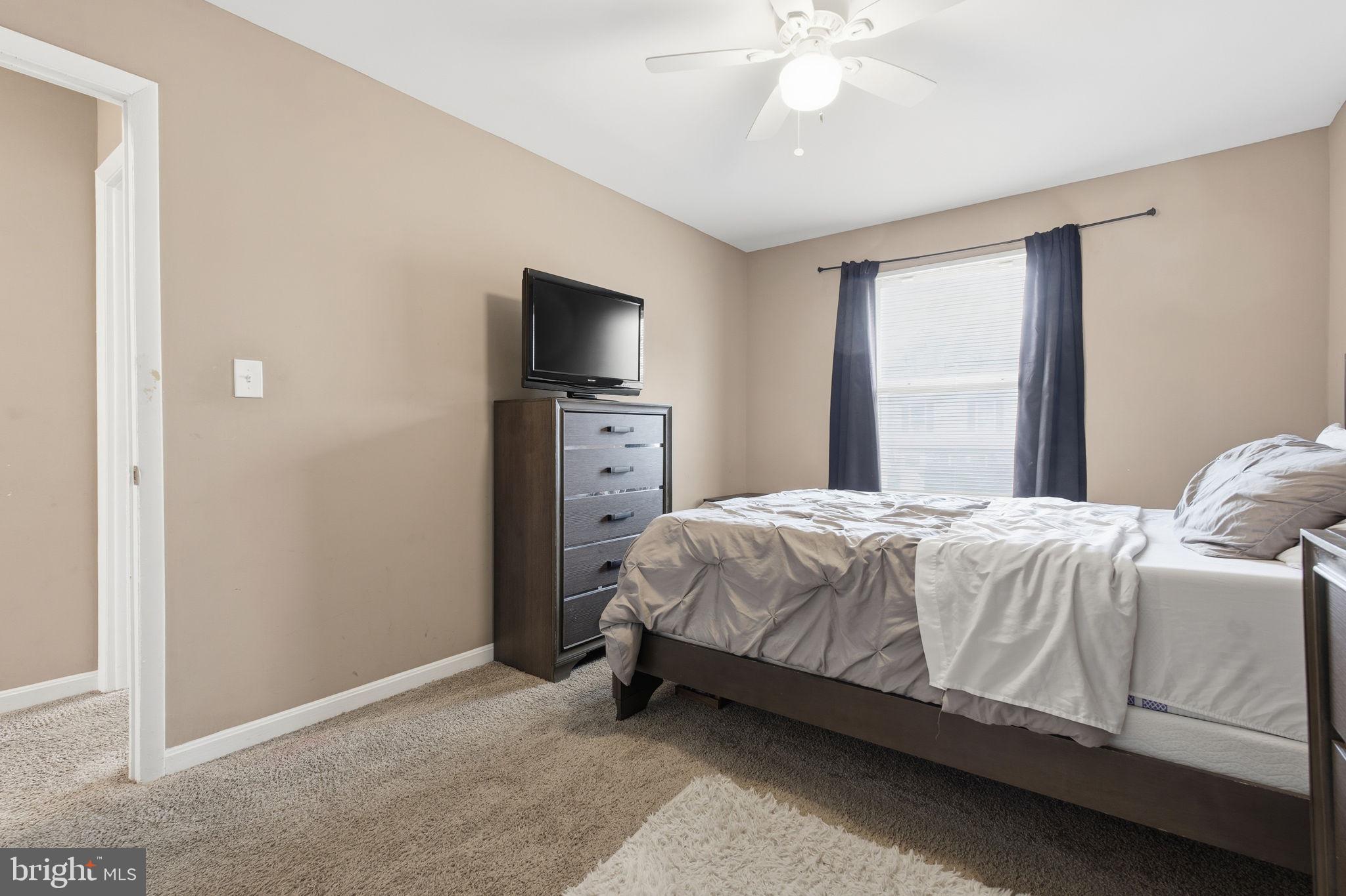 620 Yorkshire Drive Edgewood, MD 21040 - Photo 18 of 31 a bedroom with a bed and a flat screen tv