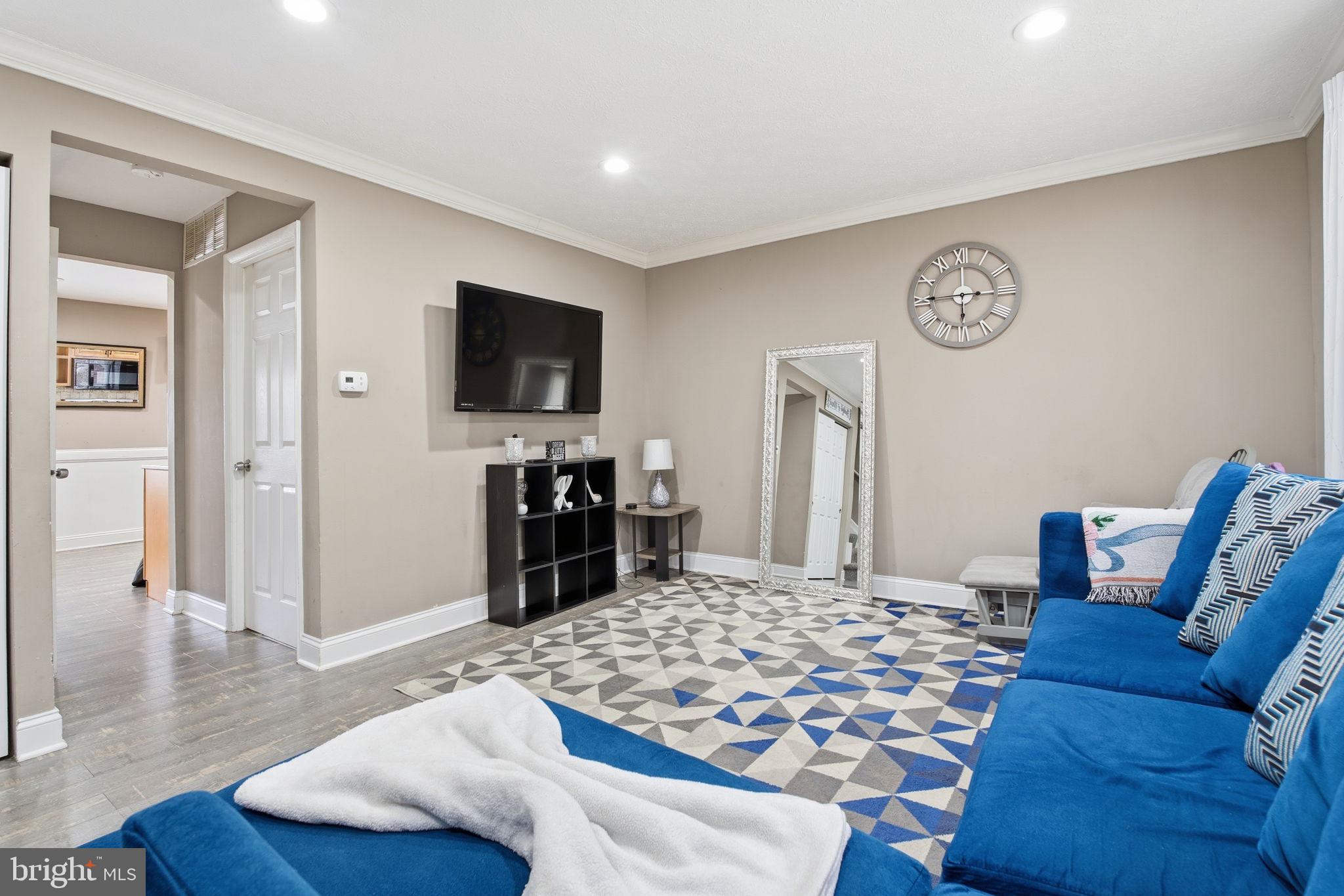 620 Yorkshire Drive Edgewood, MD 21040 - Photo 2 of 31 a bedroom with a bed and a television in it
