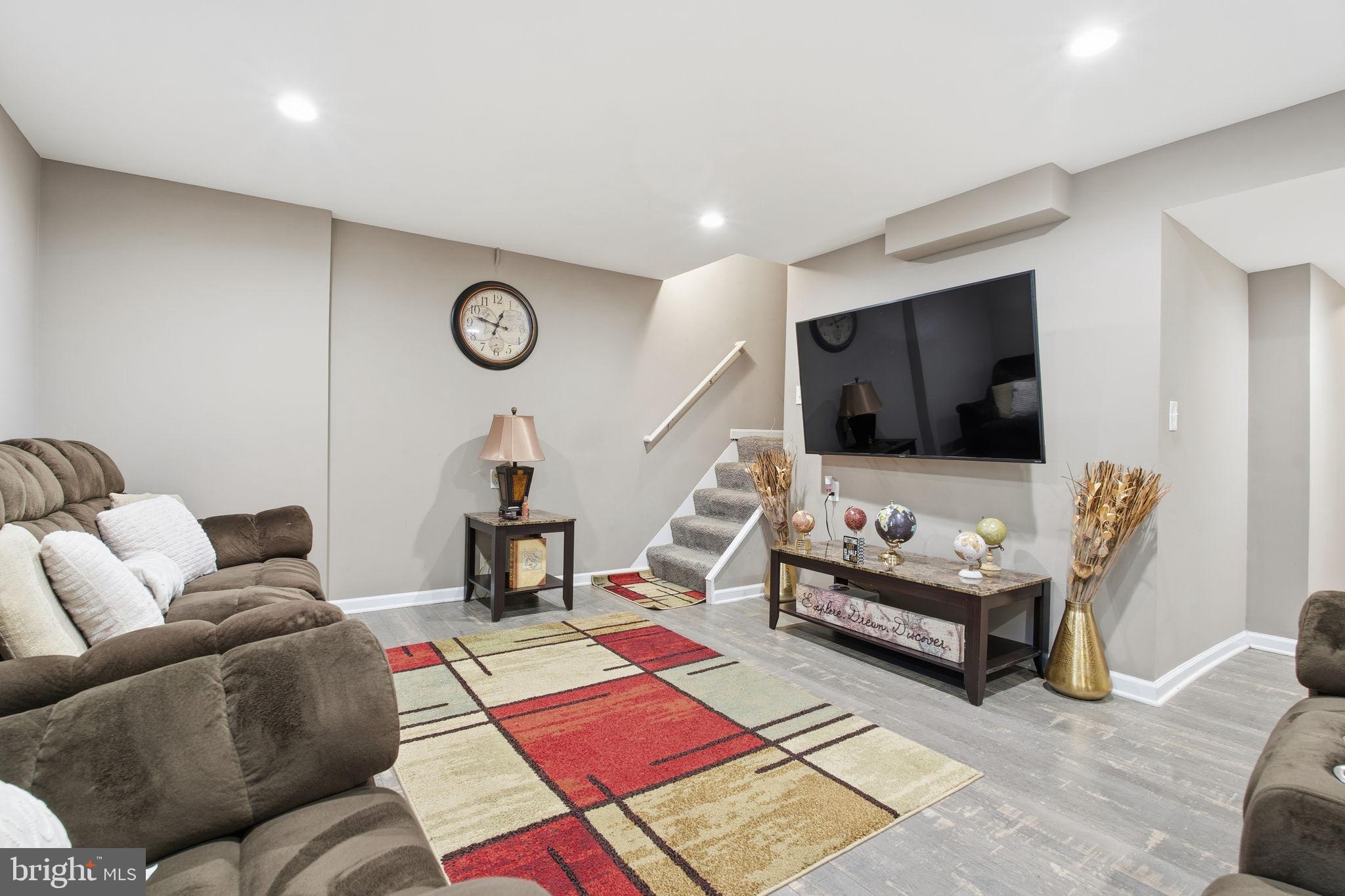 620 Yorkshire Drive Edgewood, MD 21040 - Photo 25 of 31 a living room with furniture and a flat screen tv
