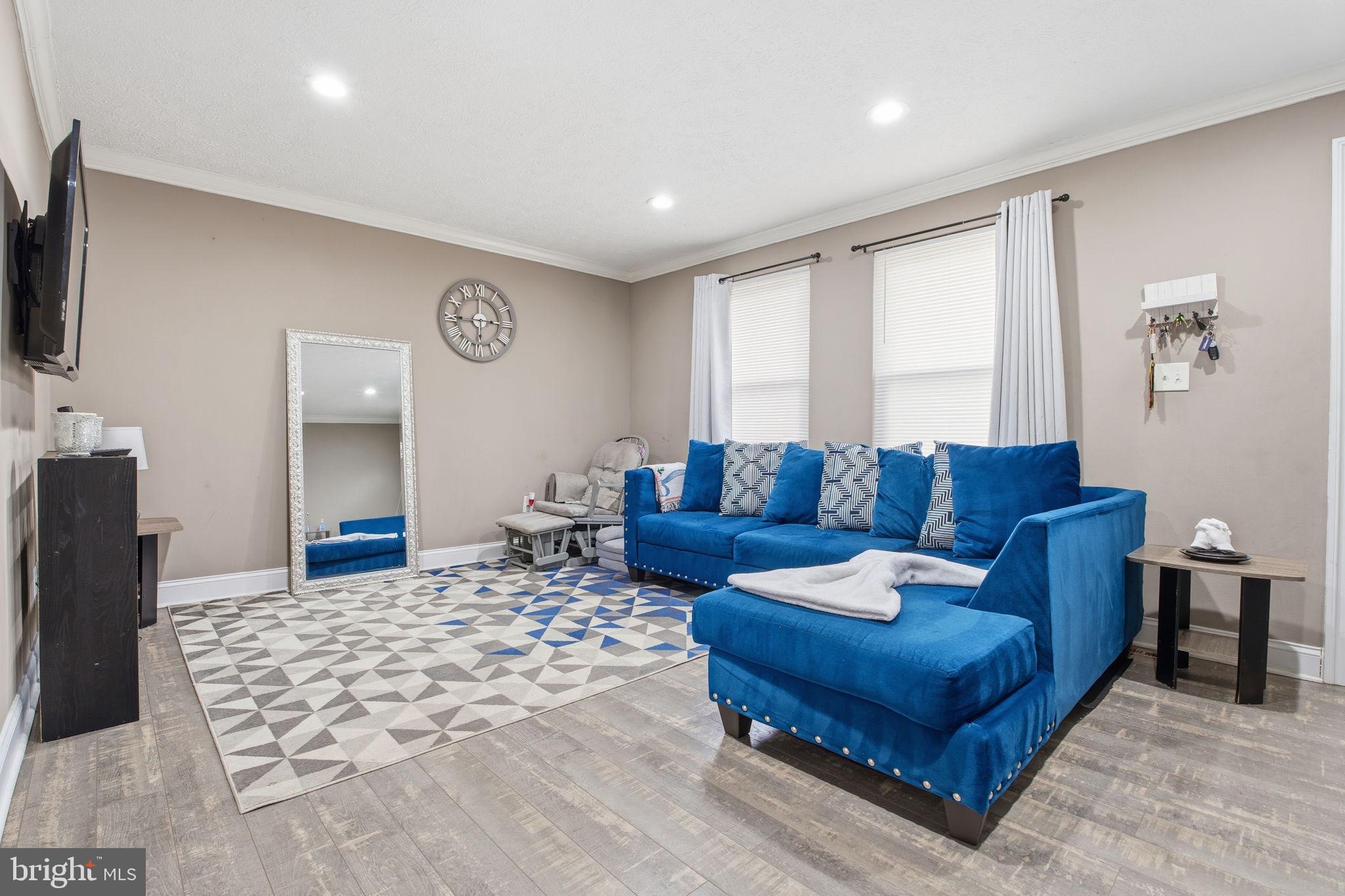 620 Yorkshire Drive Edgewood, MD 21040 - Photo 3 of 31 a living room with furniture and a flat screen tv