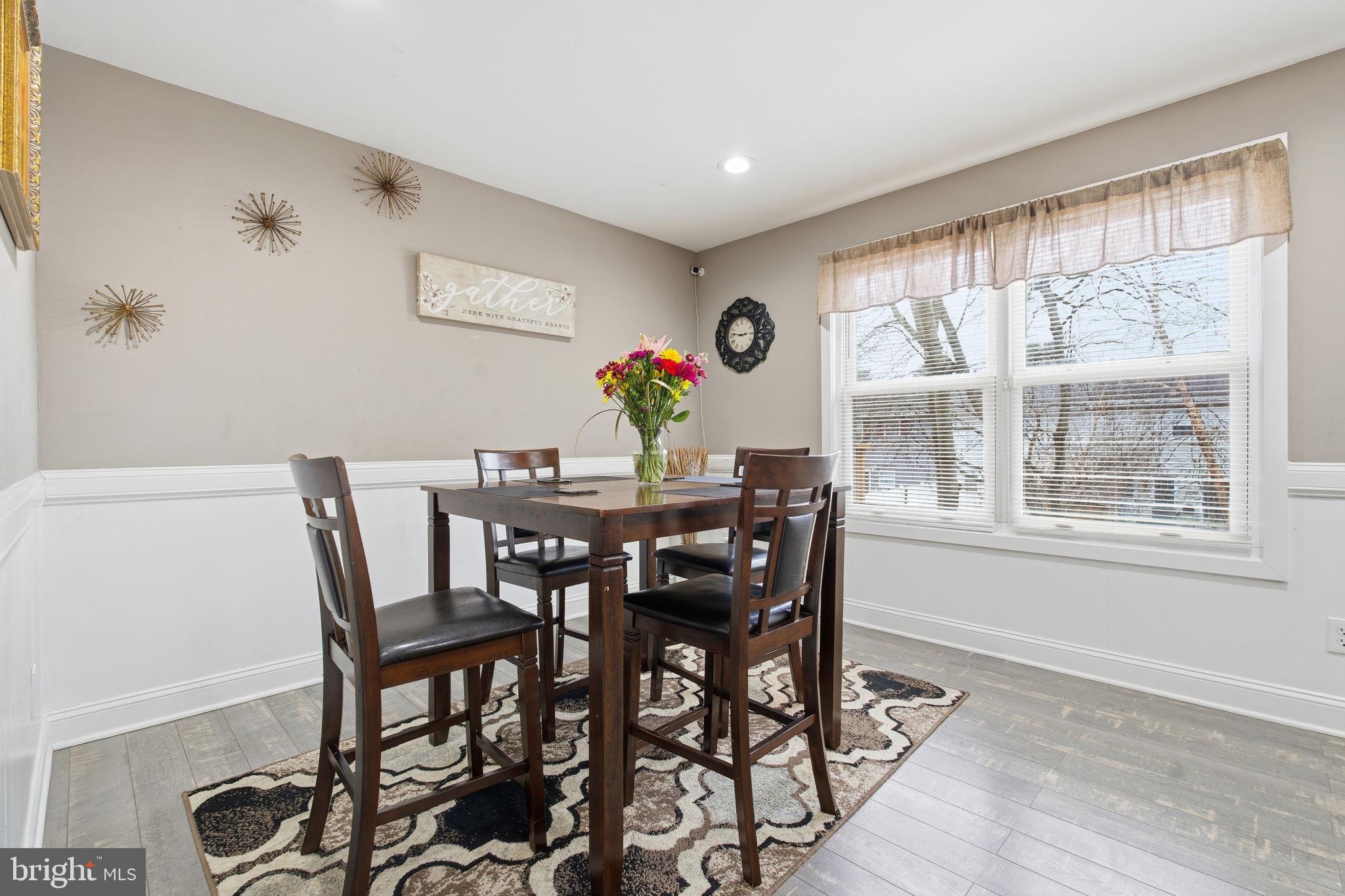620 Yorkshire Drive Edgewood, MD 21040 - Photo 10 of 31 a view of a dining room with furniture and a large window
