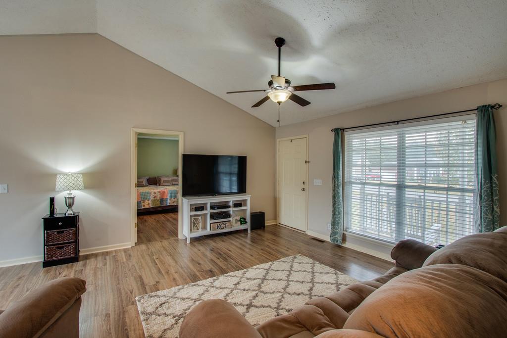 529 Windy Road Mount Juliet, TN 37122 - Photo 7 of 24 a living room with furniture and a flat screen tv