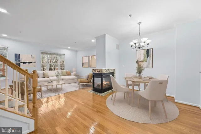 a kitchen with stainless steel appliances granite countertop a stove a refrigerator and a wooden cabinets