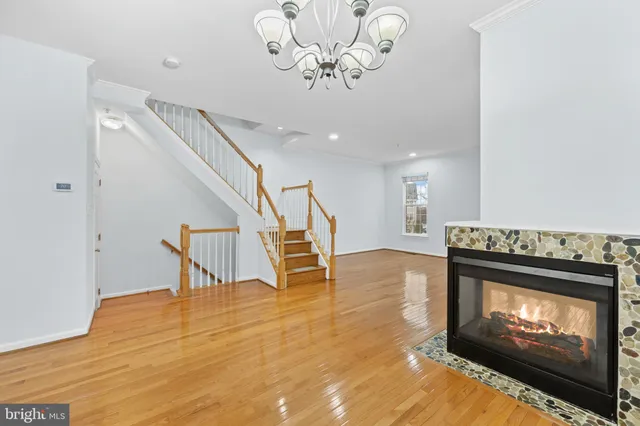 a view of balcony with wooden floor and fence