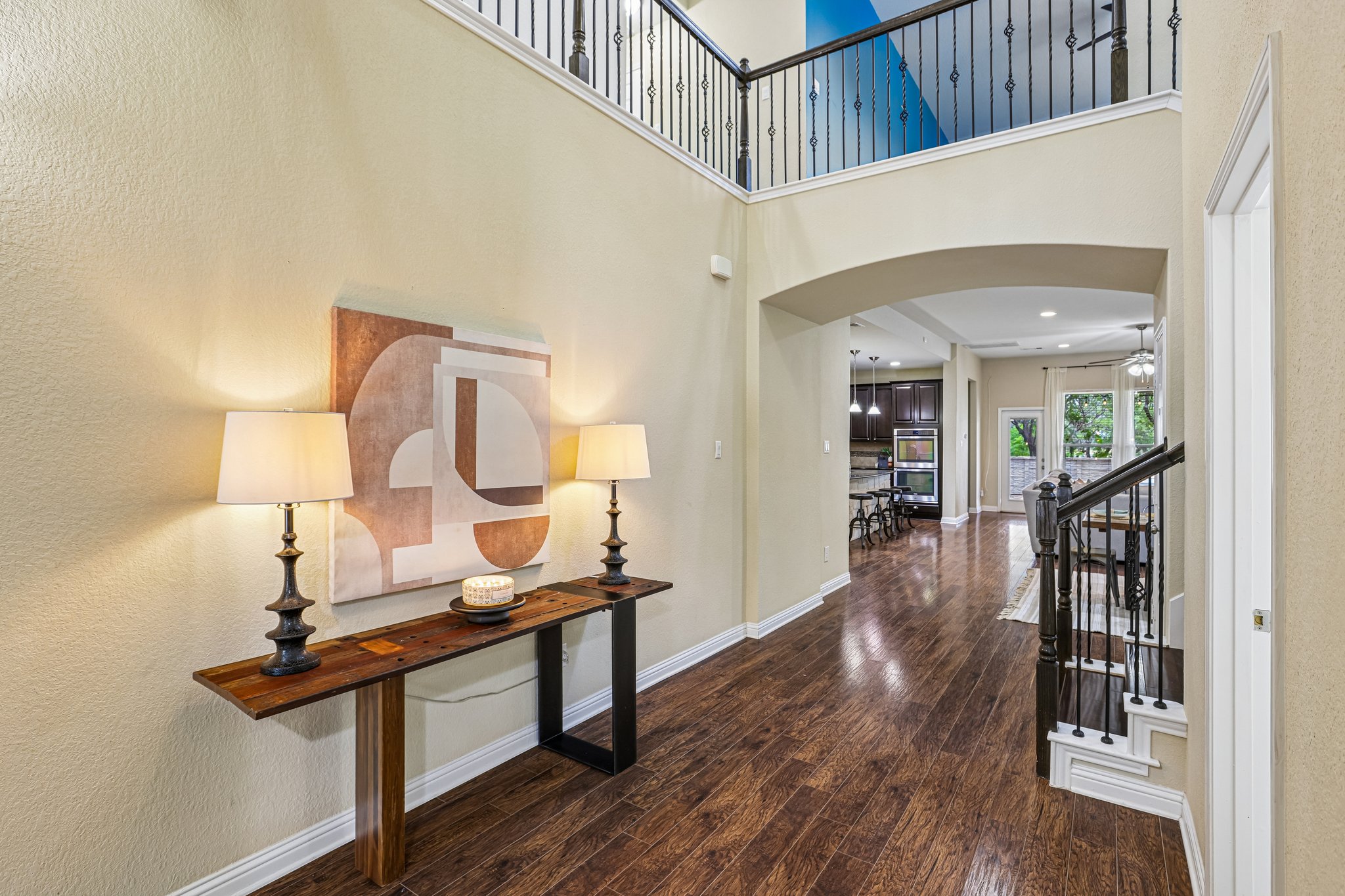 1924 Granite Springs Road Leander, TX 78641 - Photo 4 of 36 Enter into a welcoming foyer with rich hardwood flooring and an inviting open-concept design.