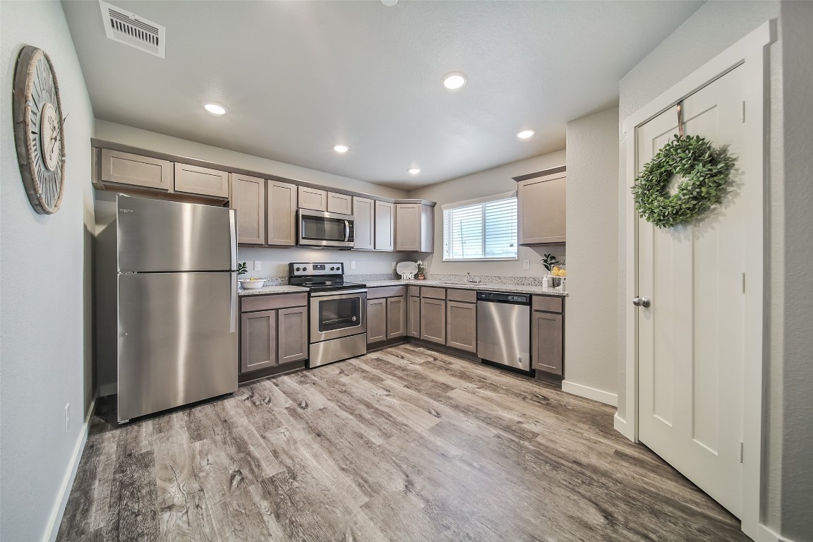 12603 Telge Road, Unit 6D Cypress, TX 77429 - Photo 9 of 31 Nice 8x10 Kitchen with granite counter tops