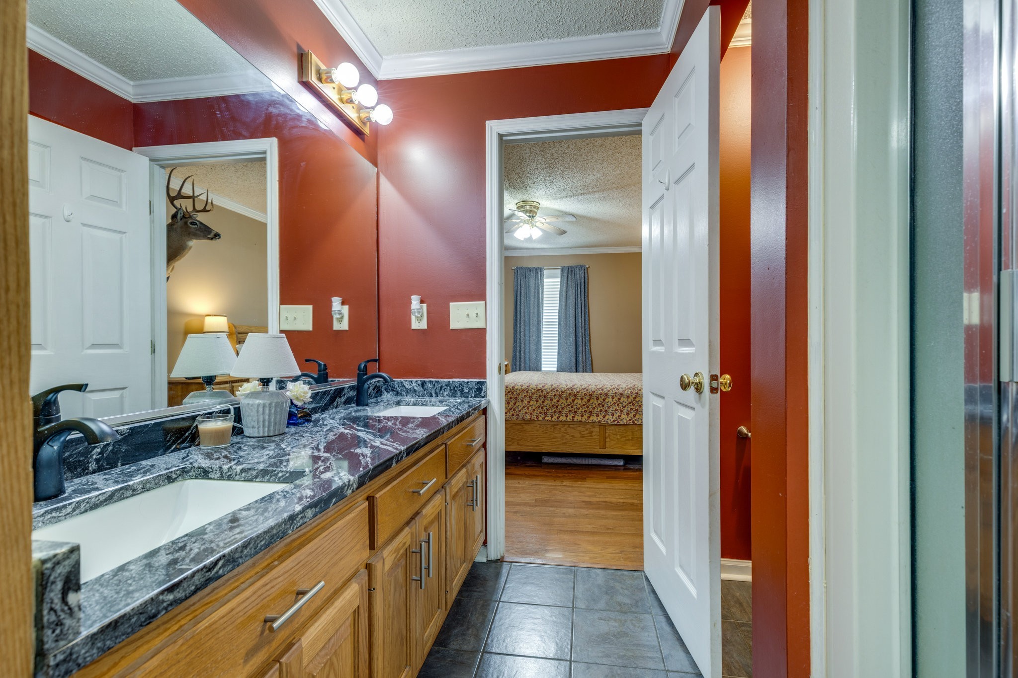 353 Major Road Cornersville, TN 37047 - Photo 15 of 74 a en suite bathroom with a granite countertop sink and a mirror
