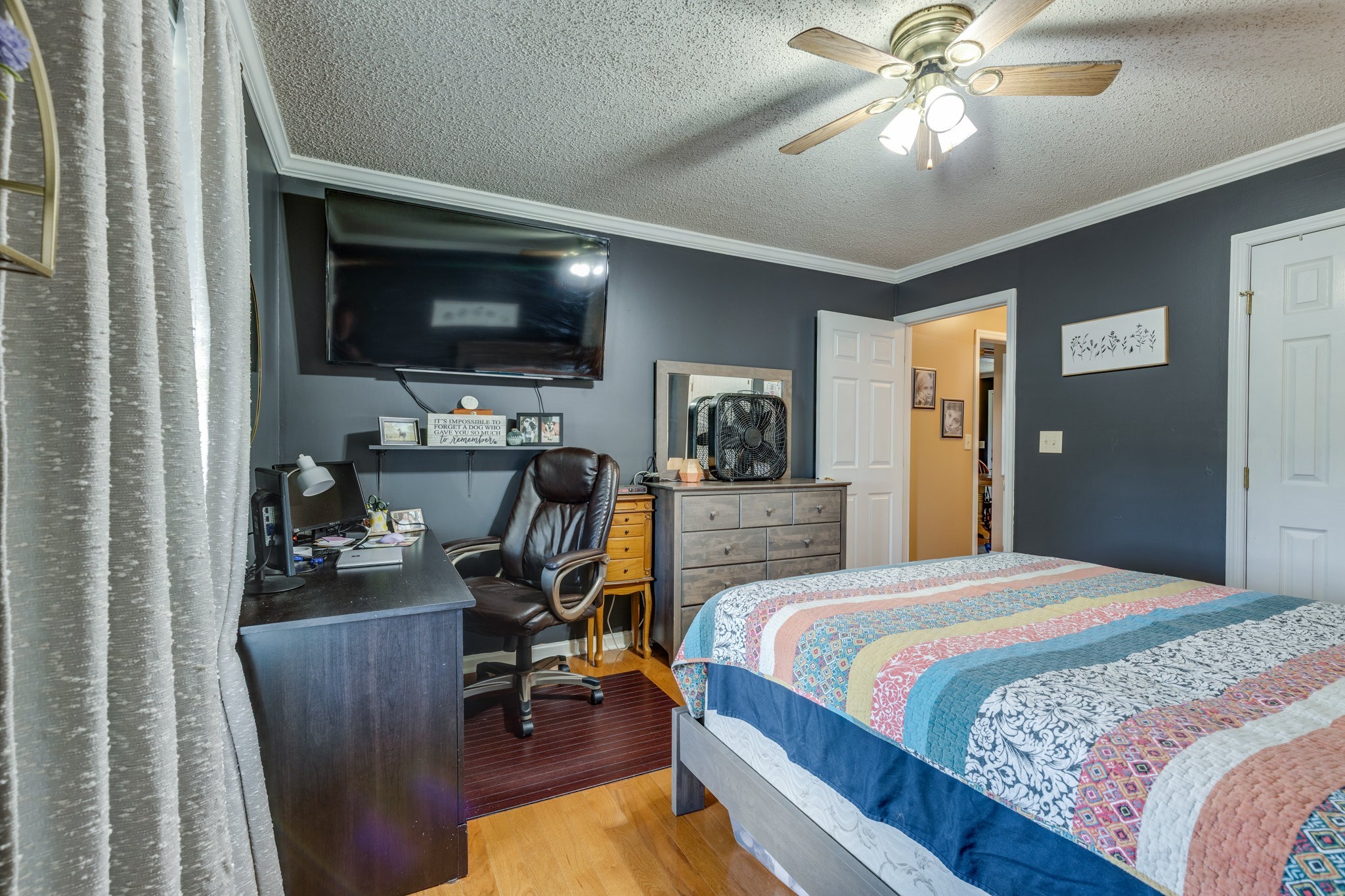 353 Major Road Cornersville, TN 37047 - Photo 21 of 74 a bedroom with a bed and a flat screen tv