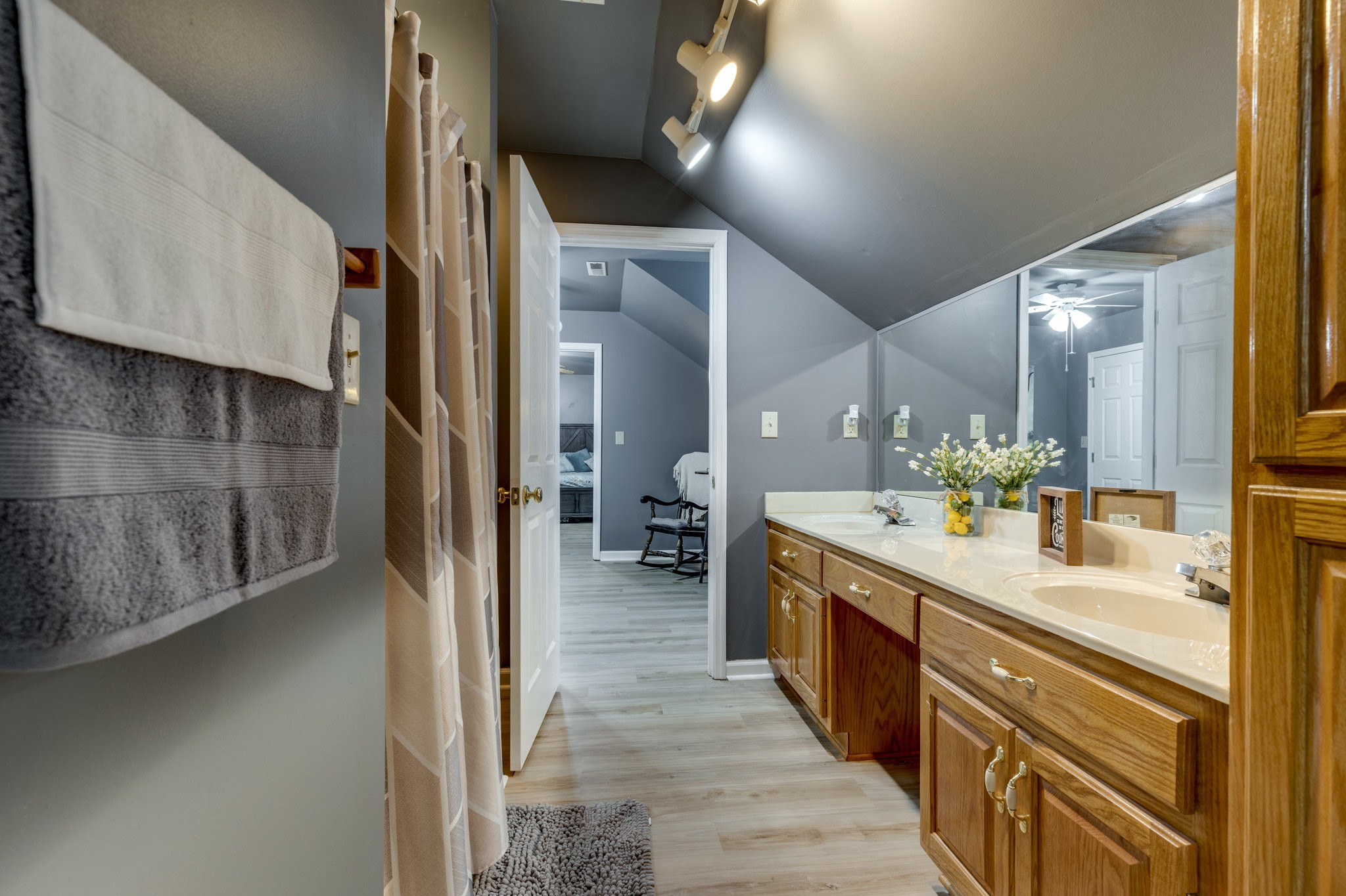 353 Major Road Cornersville, TN 37047 - Photo 28 of 74 a large bathroom with a double vanity sink and a mirror