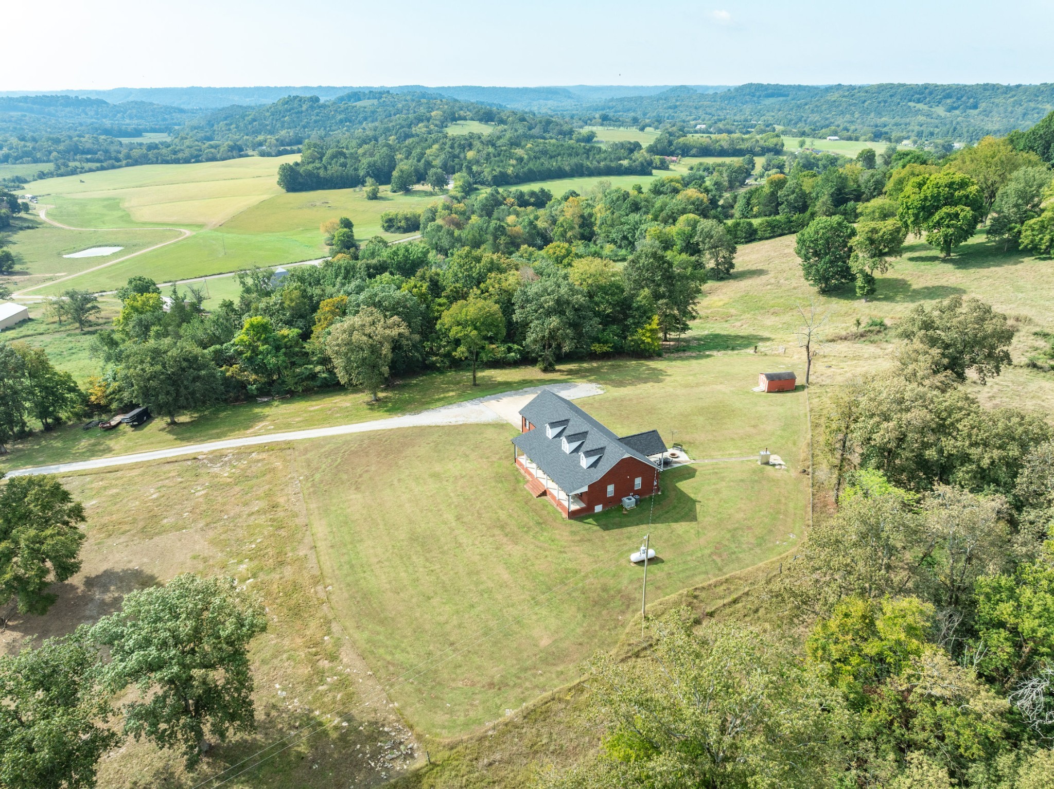 353 Major Road Cornersville, TN 37047 - Photo 46 of 74 a view of a lake with a mountain