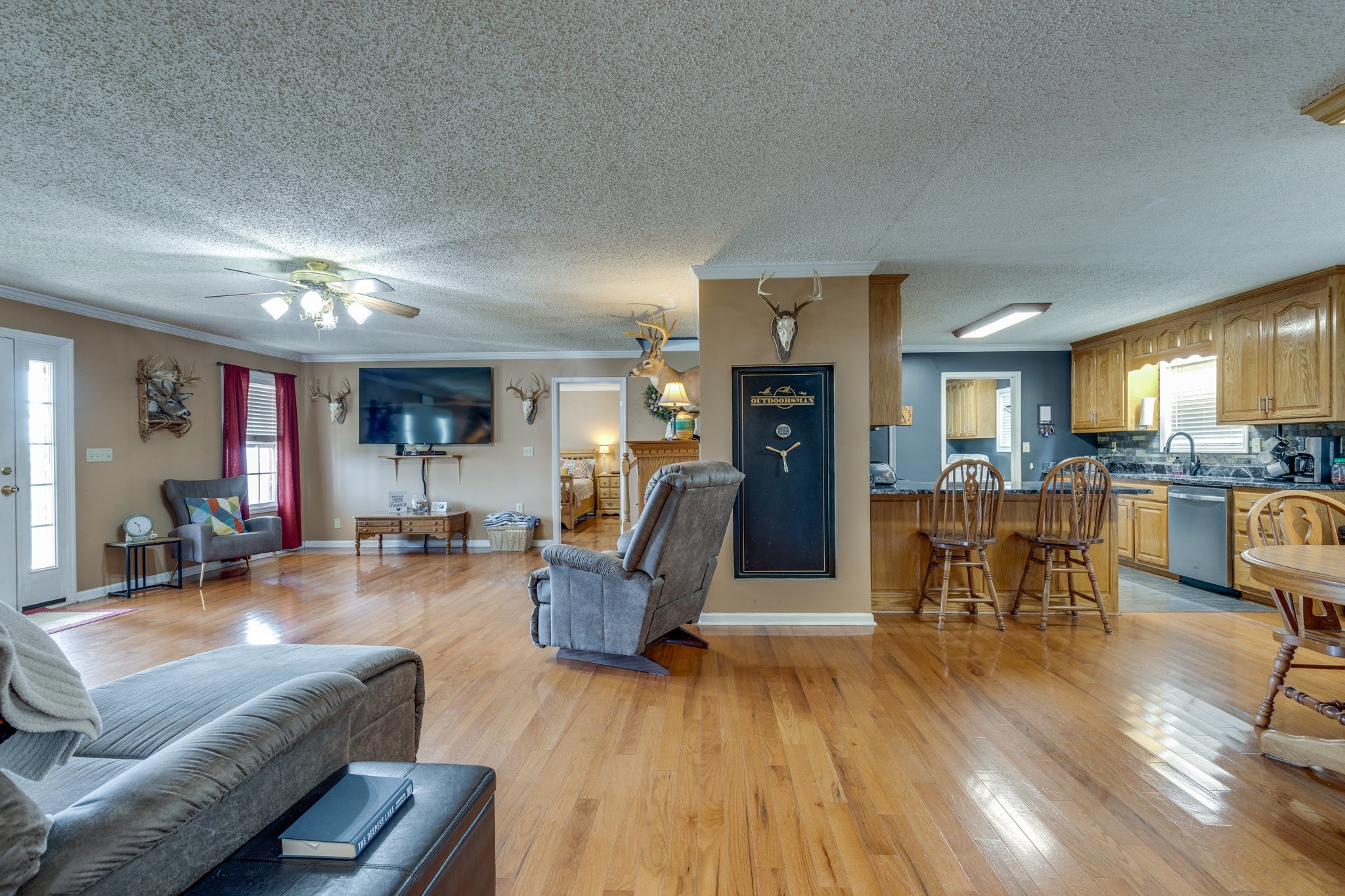 353 Major Road Cornersville, TN 37047 - Photo 6 of 74 a living room with fireplace furniture and a wooden floor