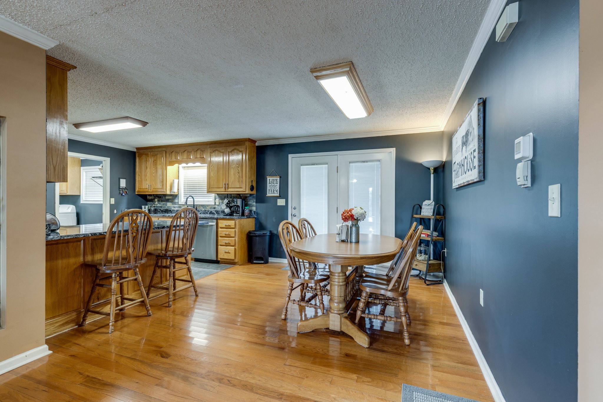353 Major Road Cornersville, TN 37047 - Photo 10 of 74 a view of a dining room with furniture and wooden floor