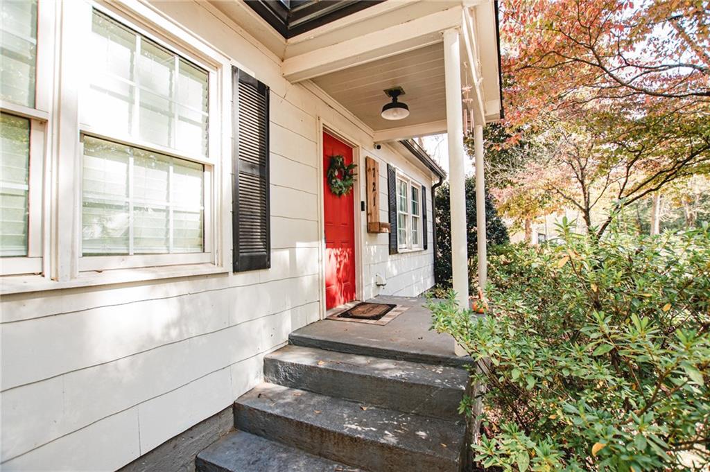 721 Davis Street Monroe, GA 30655 - Photo 3 of 20 a front view of a house with a yard
