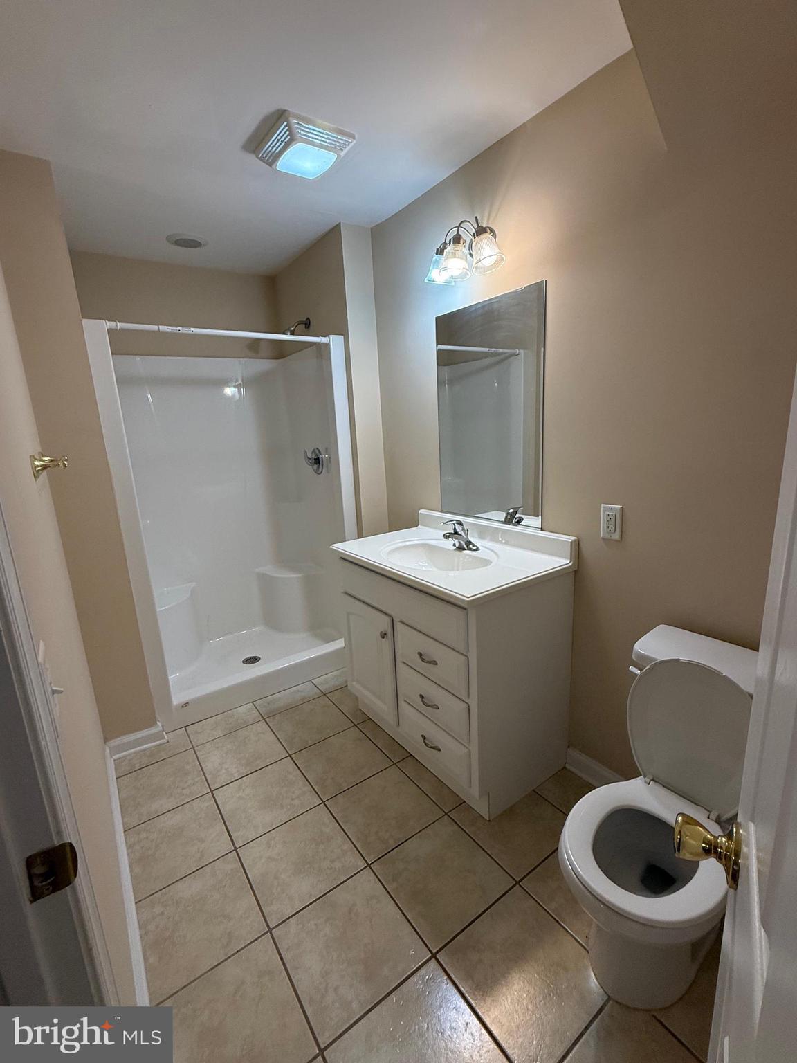 202 Bell Tower Court Stafford, VA 22554 - Photo 20 of 20 a bathroom with a sink toilet and shower