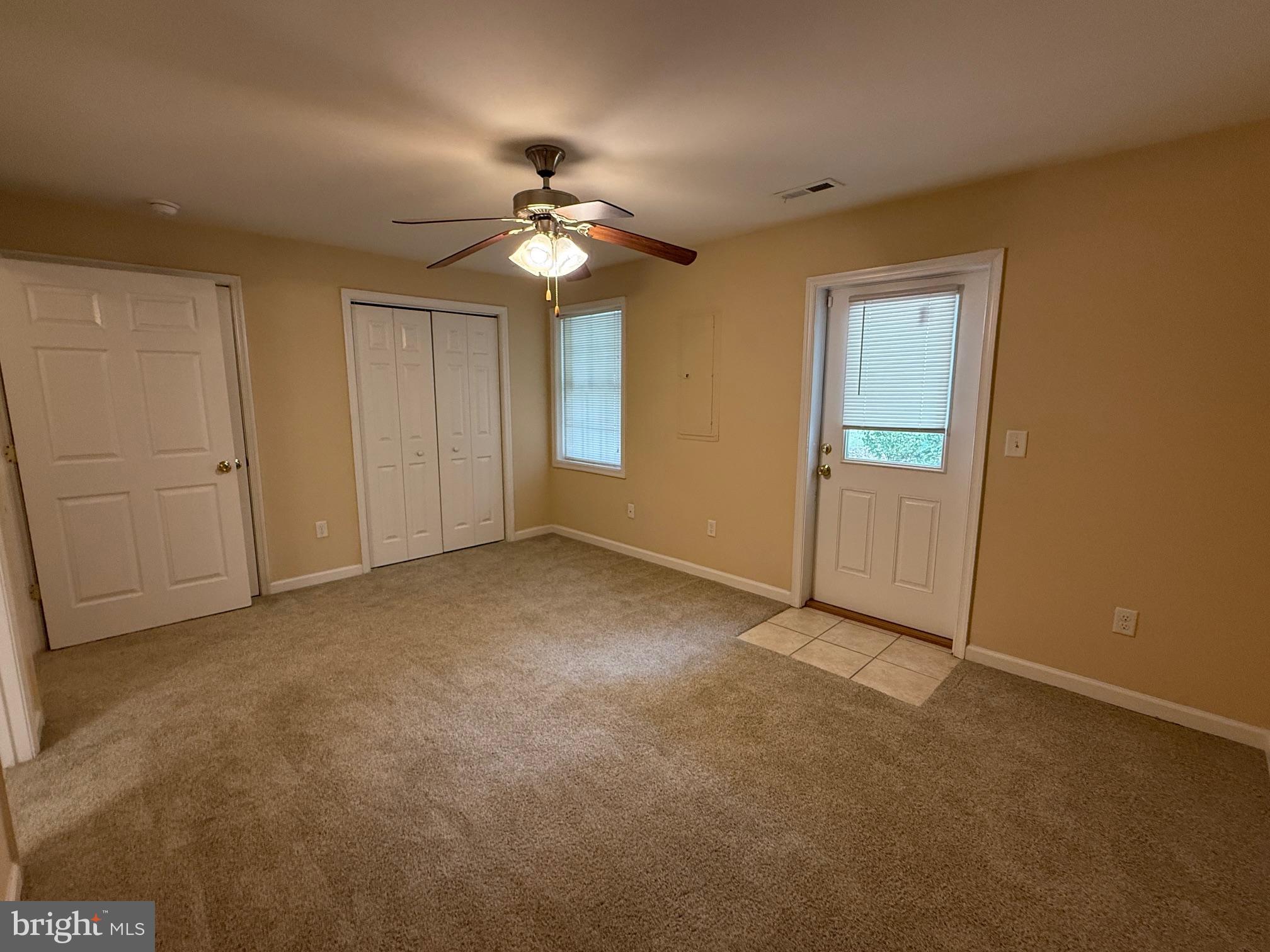 202 Bell Tower Court Stafford, VA 22554 - Photo 6 of 20 a view of an empty room with a chandelier fan