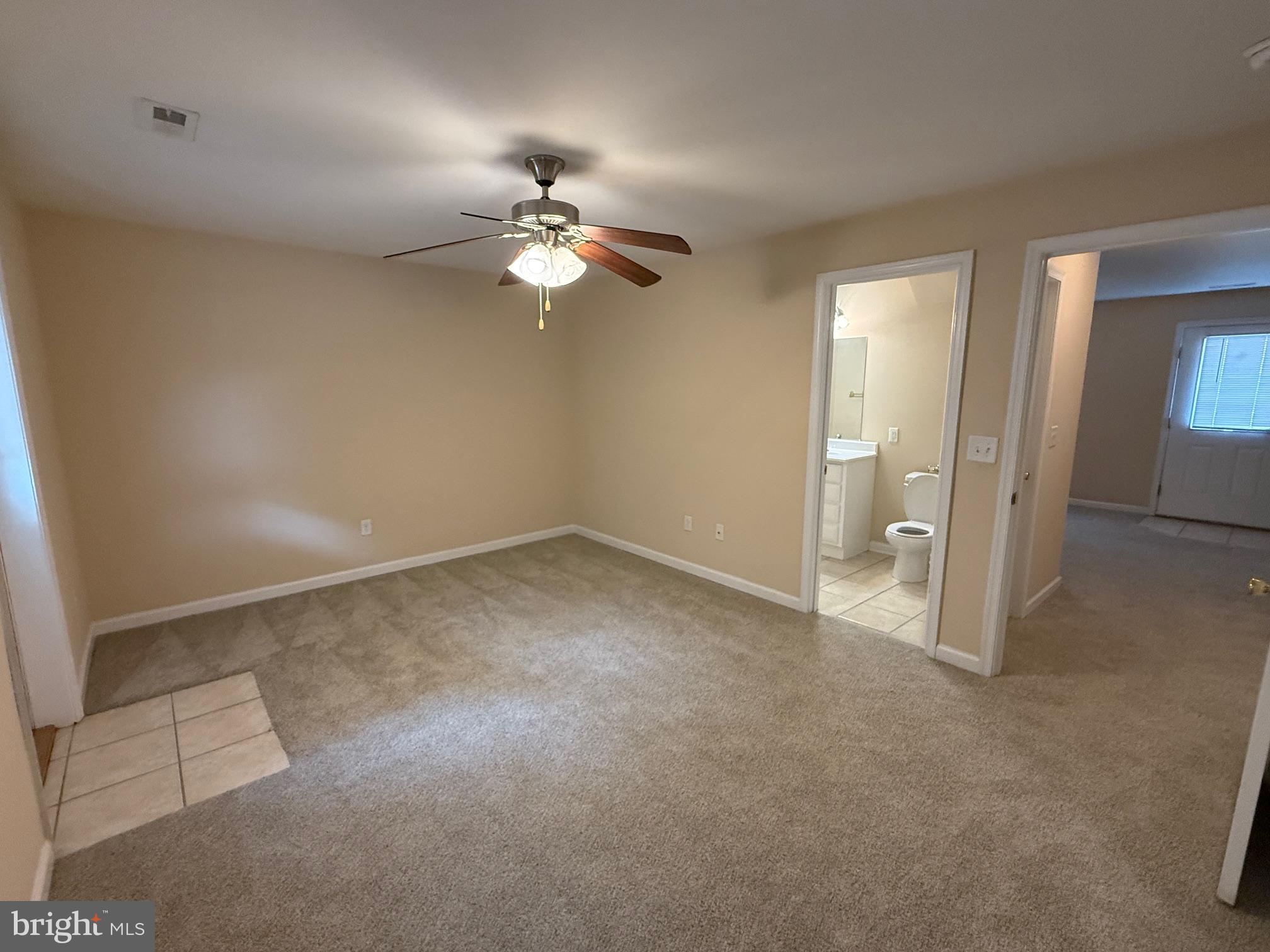 202 Bell Tower Court Stafford, VA 22554 - Photo 7 of 20 an empty room with closet and a ceiling fan