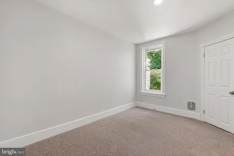 a view of a livingroom with a hallway