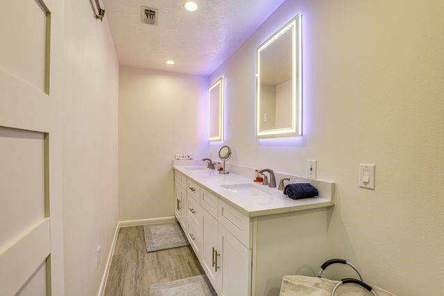 3362 Desert Inn Drive Montgomery, TX 77356 - Photo 21 of 50 a bathroom with a sink and a mirror
