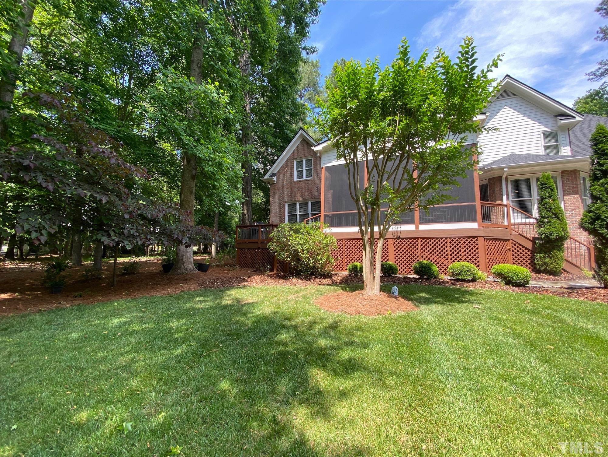 3940 White Chapel Way Raleigh, NC 27615 - Photo 3 of 40 front view of a house with a yard
