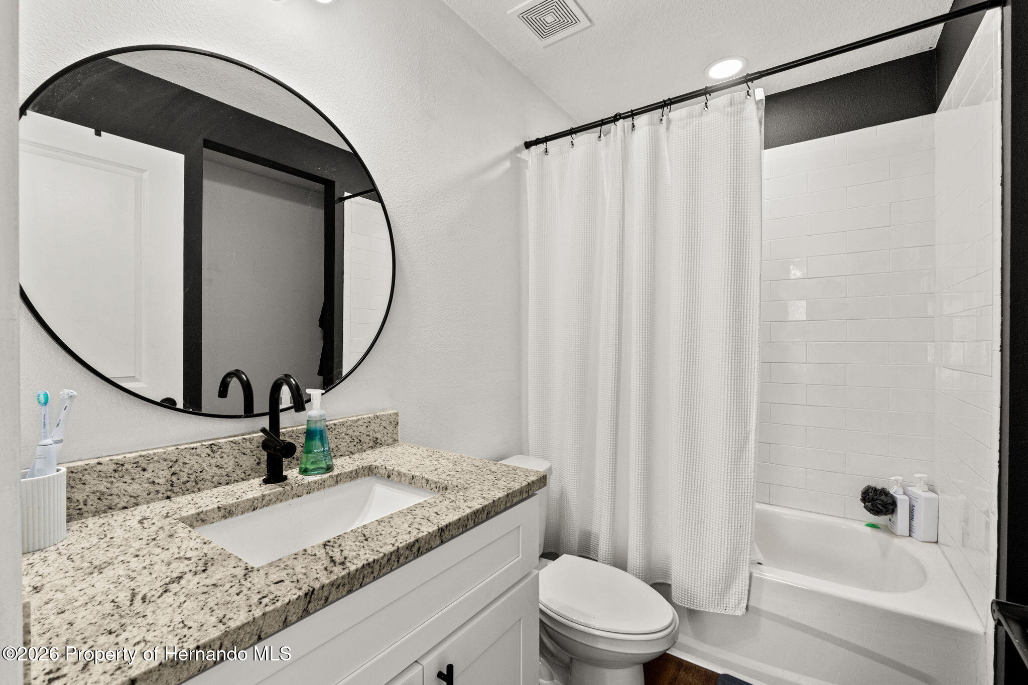 12482 Mountain Plover Road Weeki Wachee, FL 34614 - Photo 15 of 22 Primary bathroom