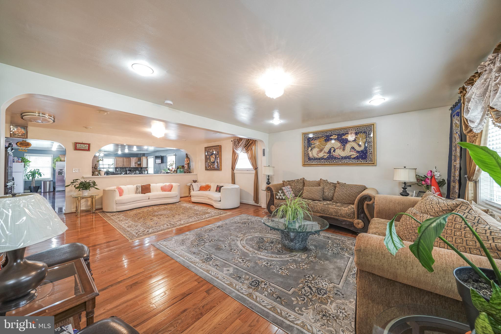 11505 Veirs Mill Road Silver Spring, MD 20902 - Photo 14 of 87 FORMAL LIVING ROOM