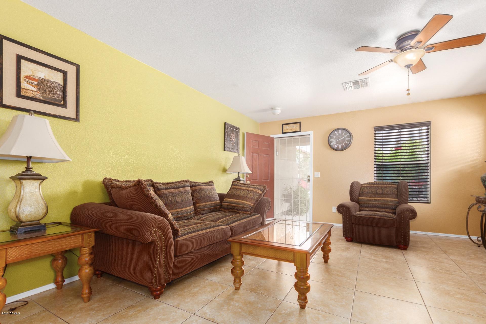 9715 West Payson Road Tolleson, AZ 85353 - Photo 5 of 20 a living room with furniture