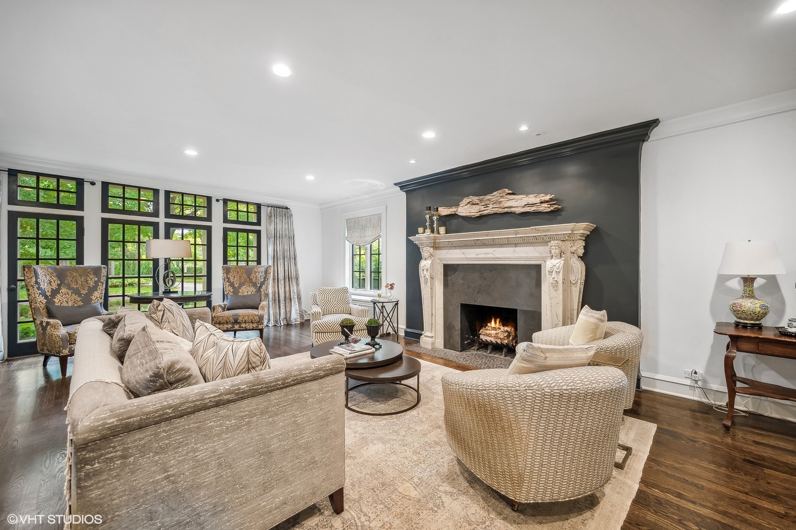 354 Elder Lane Winnetka, IL 60093 - Photo 11 of 71 a living room with furniture and a fireplace