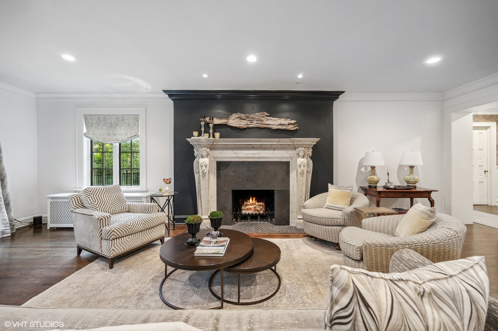 354 Elder Lane Winnetka, IL 60093 - Photo 12 of 71 a living room with furniture and a fireplace