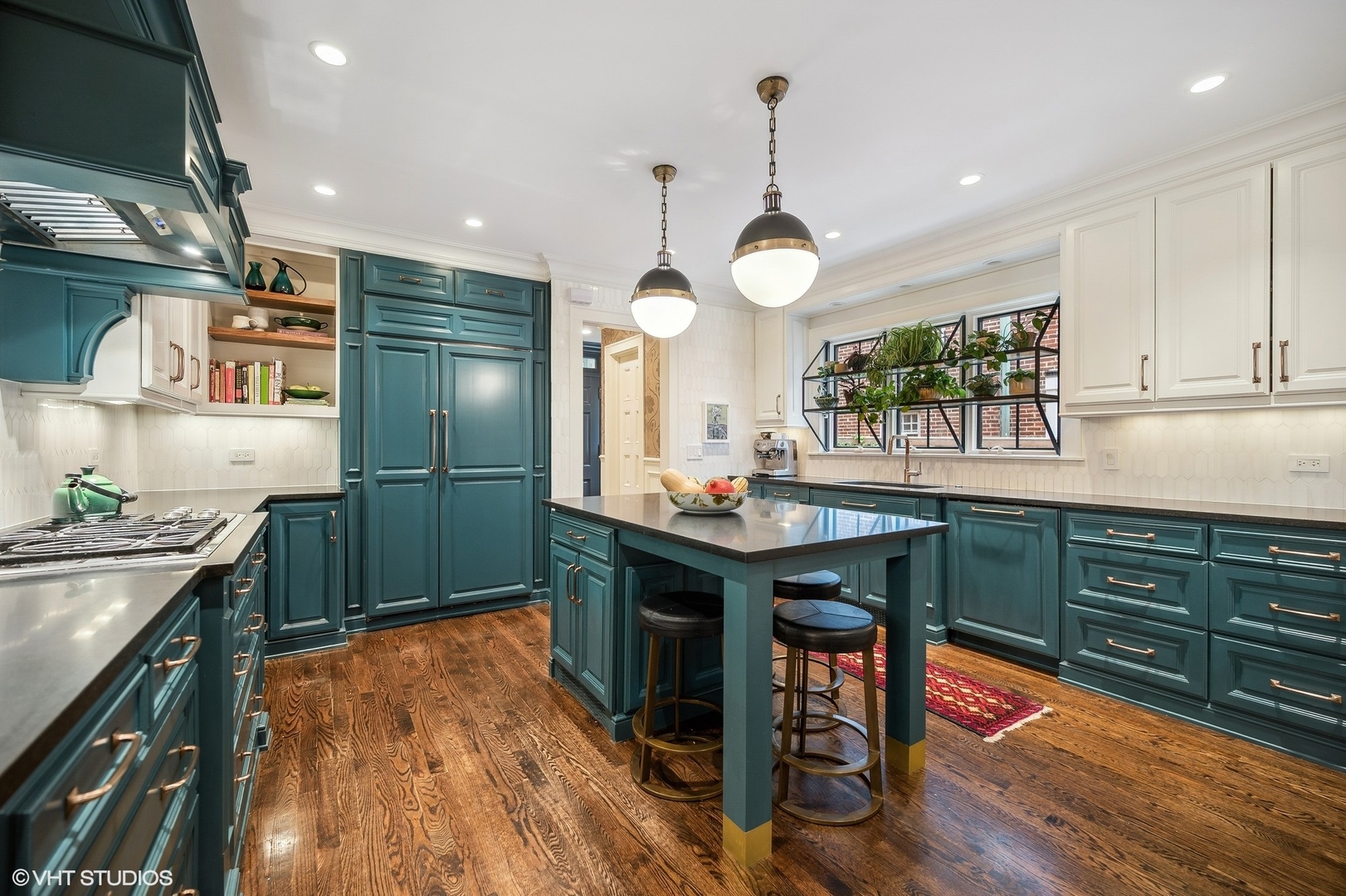 354 Elder Lane Winnetka, IL 60093 - Photo 28 of 71 a kitchen with stainless steel appliances granite countertop a stove a sink dishwasher and a refrigerator with wooden floor