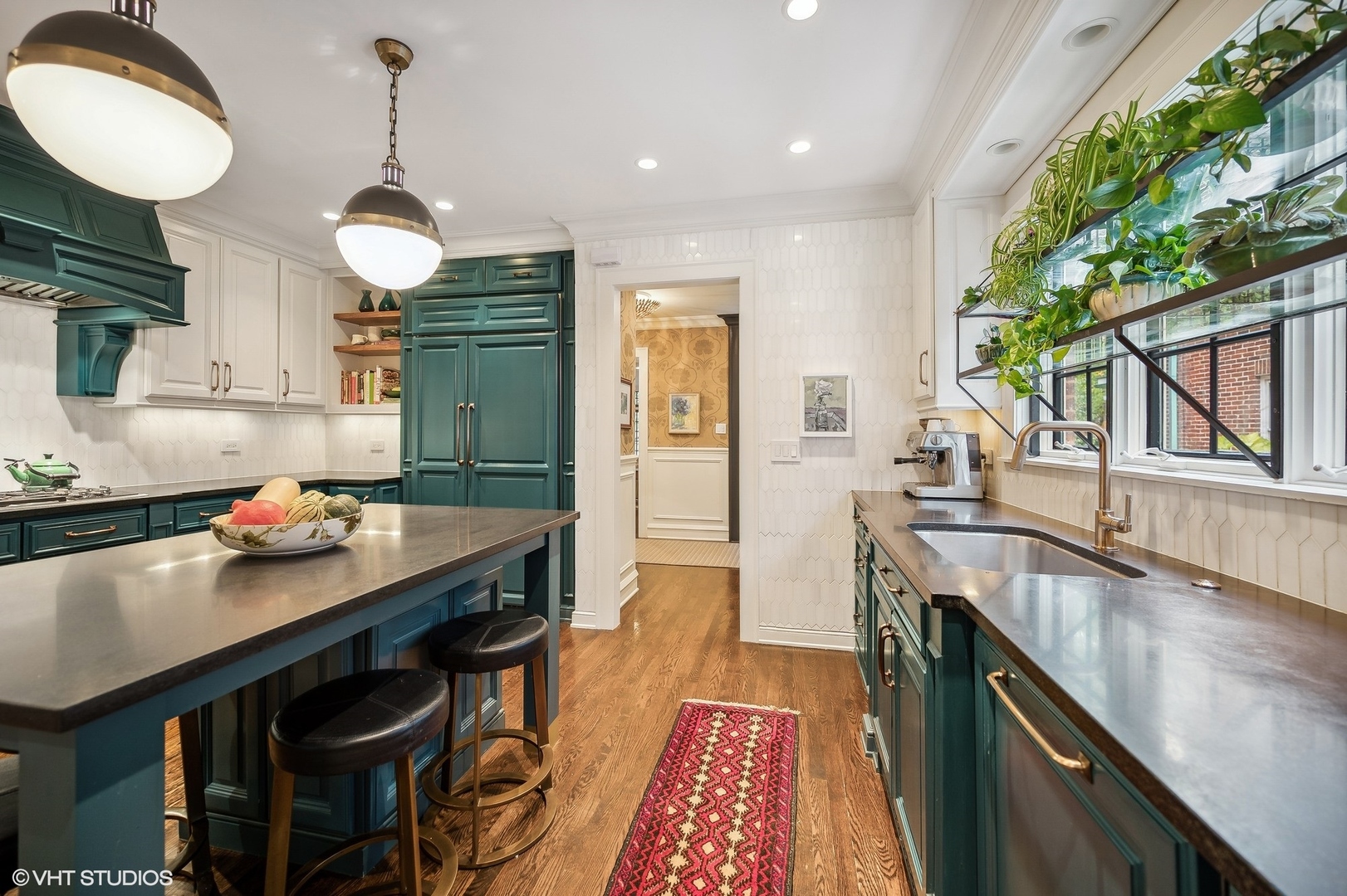 354 Elder Lane Winnetka, IL 60093 - Photo 34 of 71 a kitchen with granite countertop a sink a stove and a wooden floors