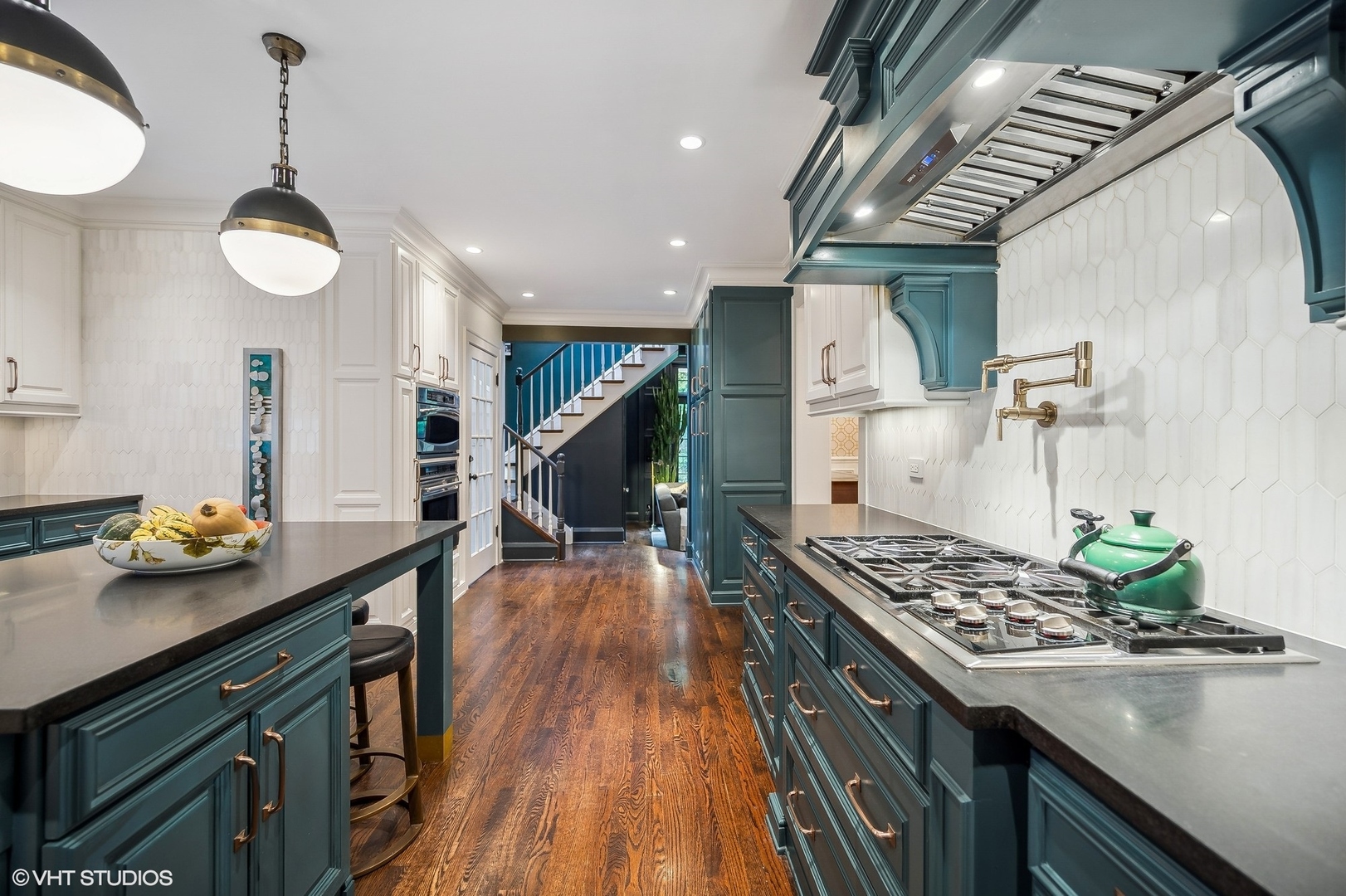 354 Elder Lane Winnetka, IL 60093 - Photo 36 of 71 a kitchen with stainless steel appliances granite countertop a stove and a wooden floors