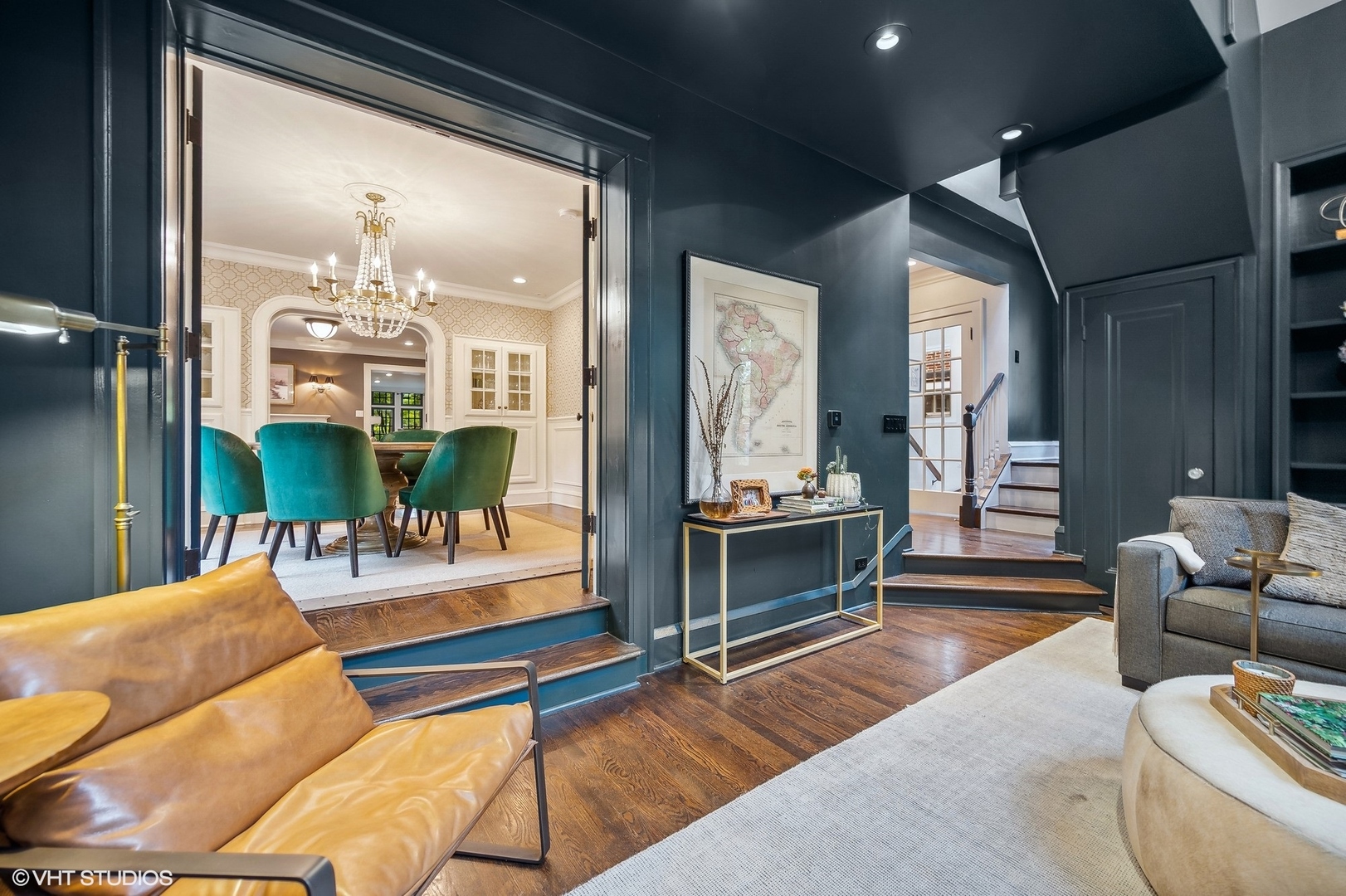 354 Elder Lane Winnetka, IL 60093 - Photo 47 of 71 a living room with furniture and a chandelier