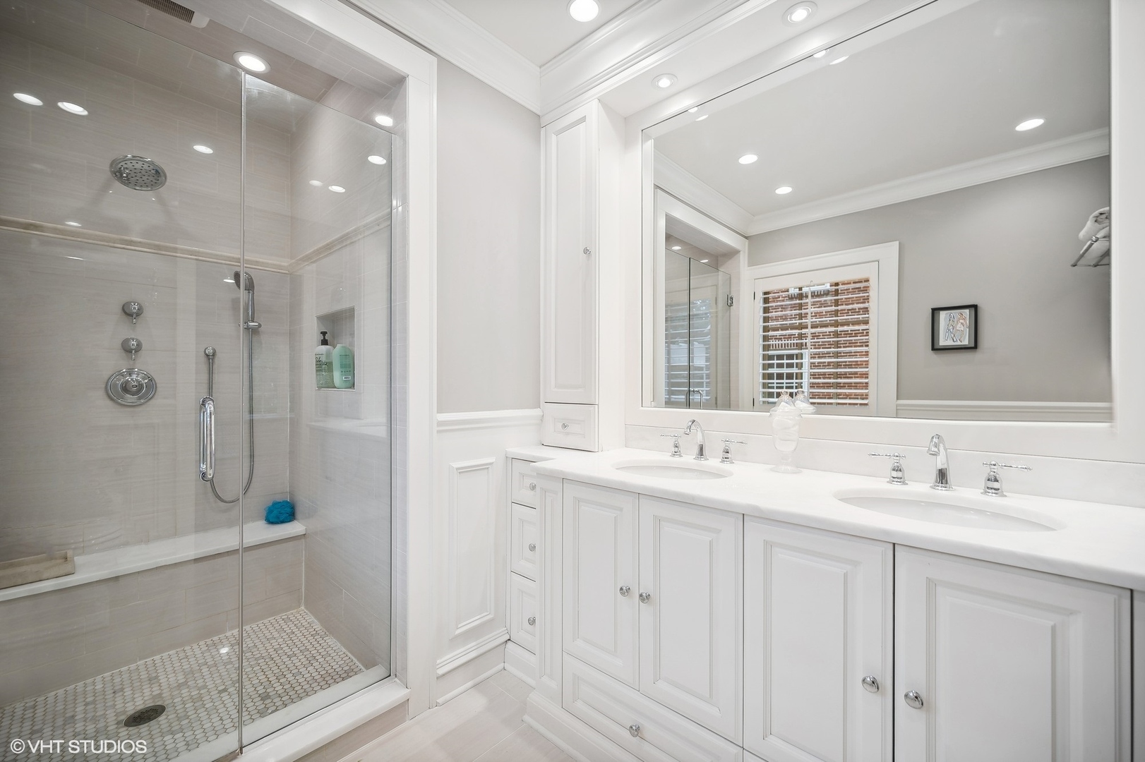 354 Elder Lane Winnetka, IL 60093 - Photo 56 of 71 a bathroom with double sink and a mirror
