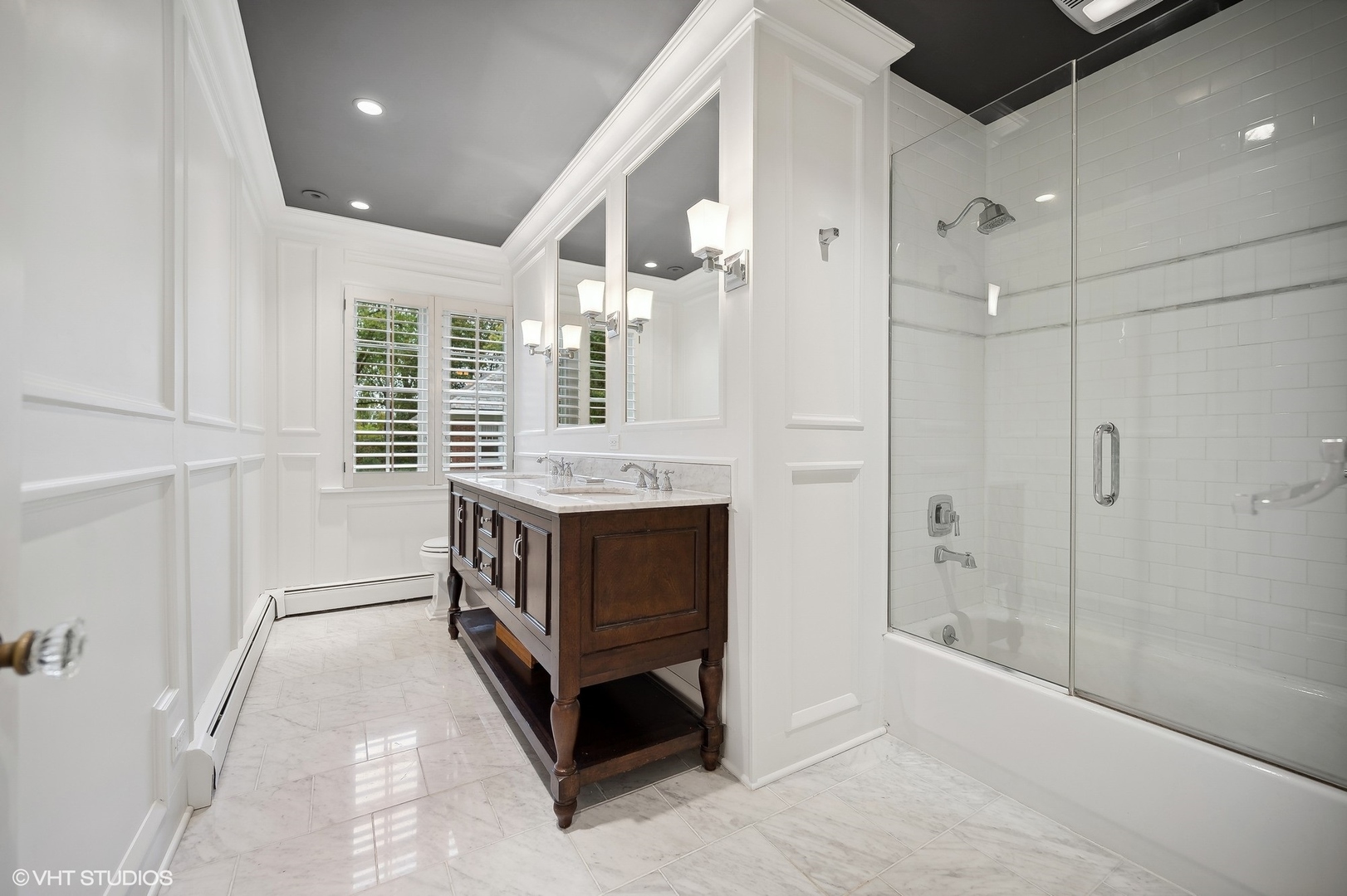 354 Elder Lane Winnetka, IL 60093 - Photo 60 of 71 a bathroom with a bathtub and a shower