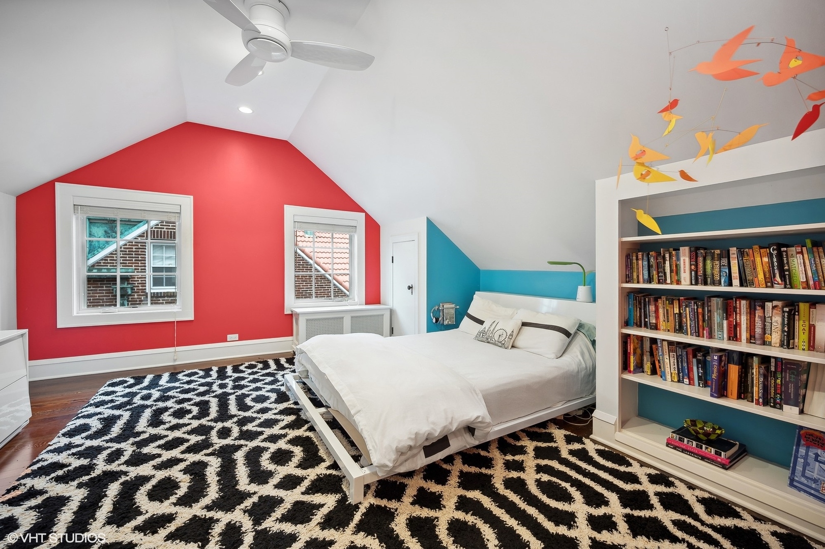 354 Elder Lane Winnetka, IL 60093 - Photo 62 of 71 a bedroom with a bed and a book shelf