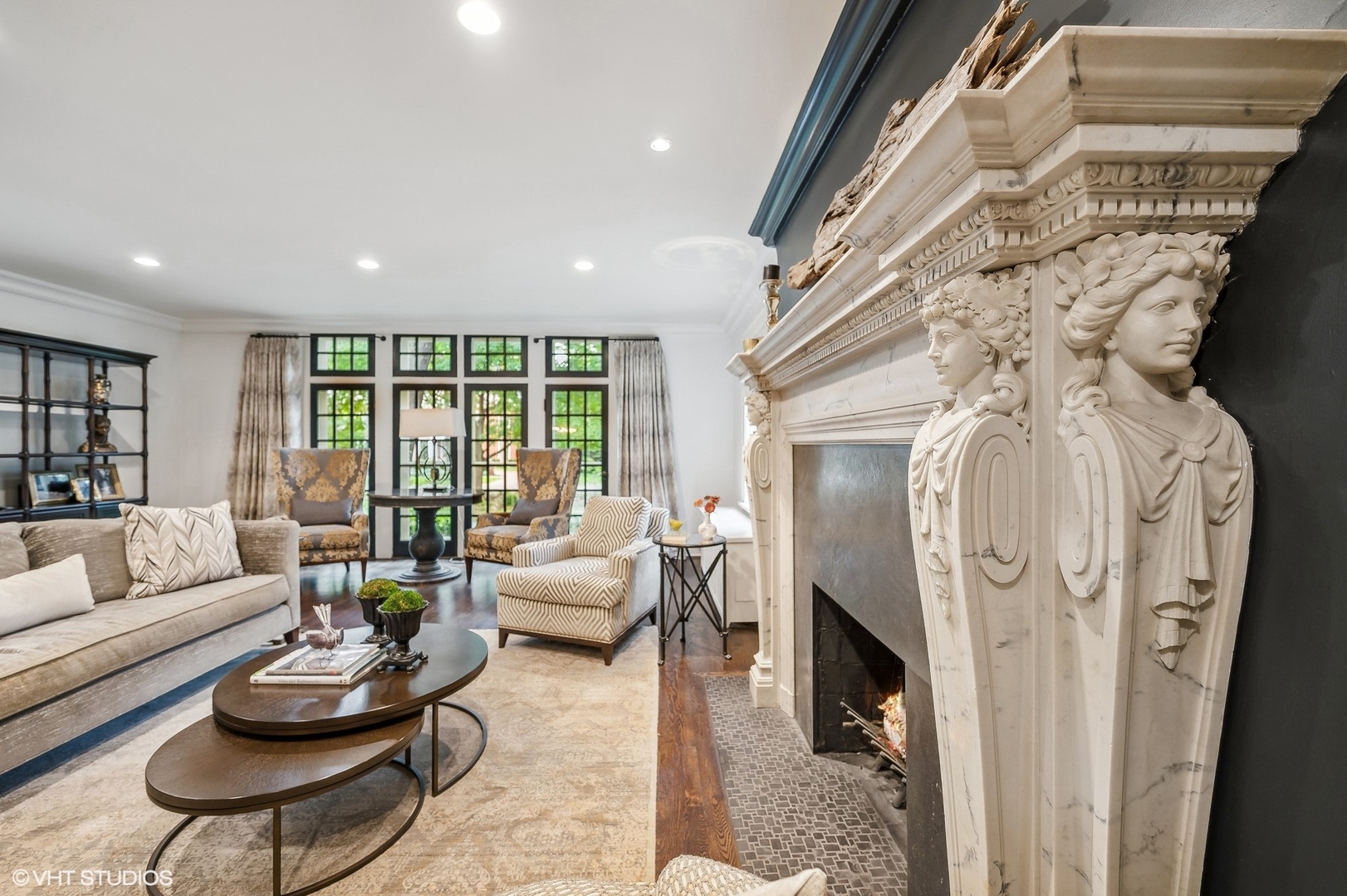 354 Elder Lane Winnetka, IL 60093 - Photo 10 of 71 a living room with furniture and a fireplace