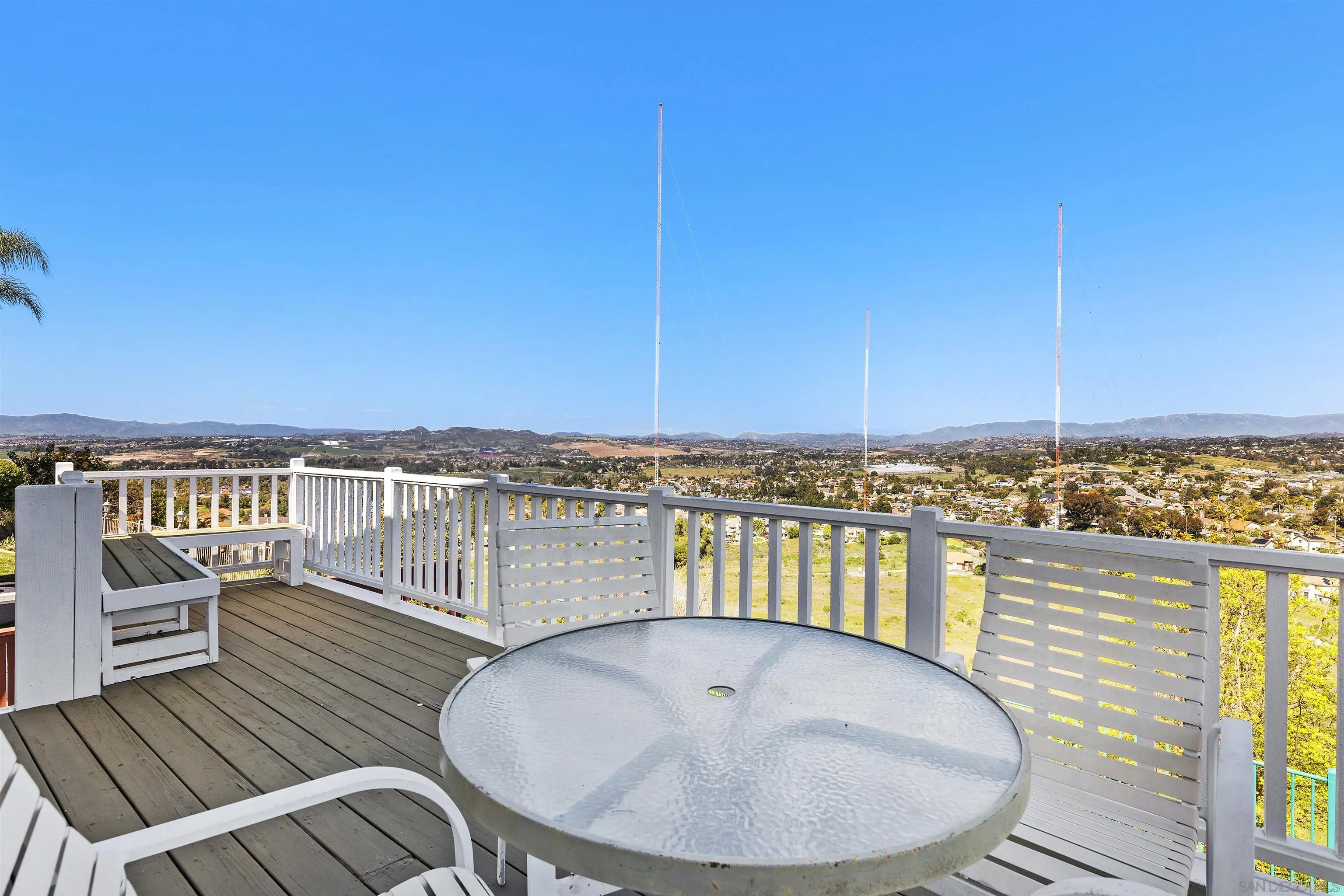 5213 Palmera Drive Oceanside, CA 92056 - Photo 31 of 38 a terrace of a house with wooden floor