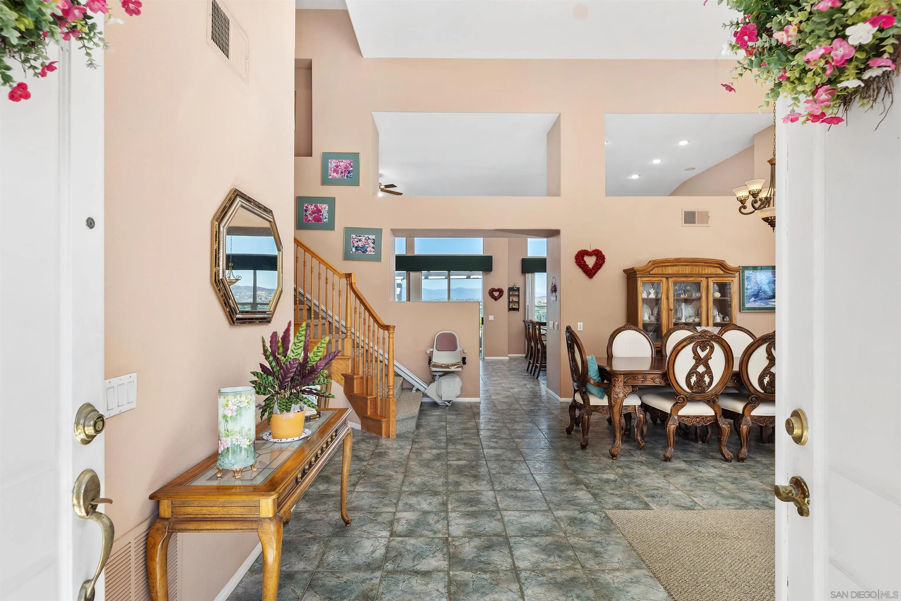 5213 Palmera Drive Oceanside, CA 92056 - Photo 7 of 38 a living room with furniture and flowers