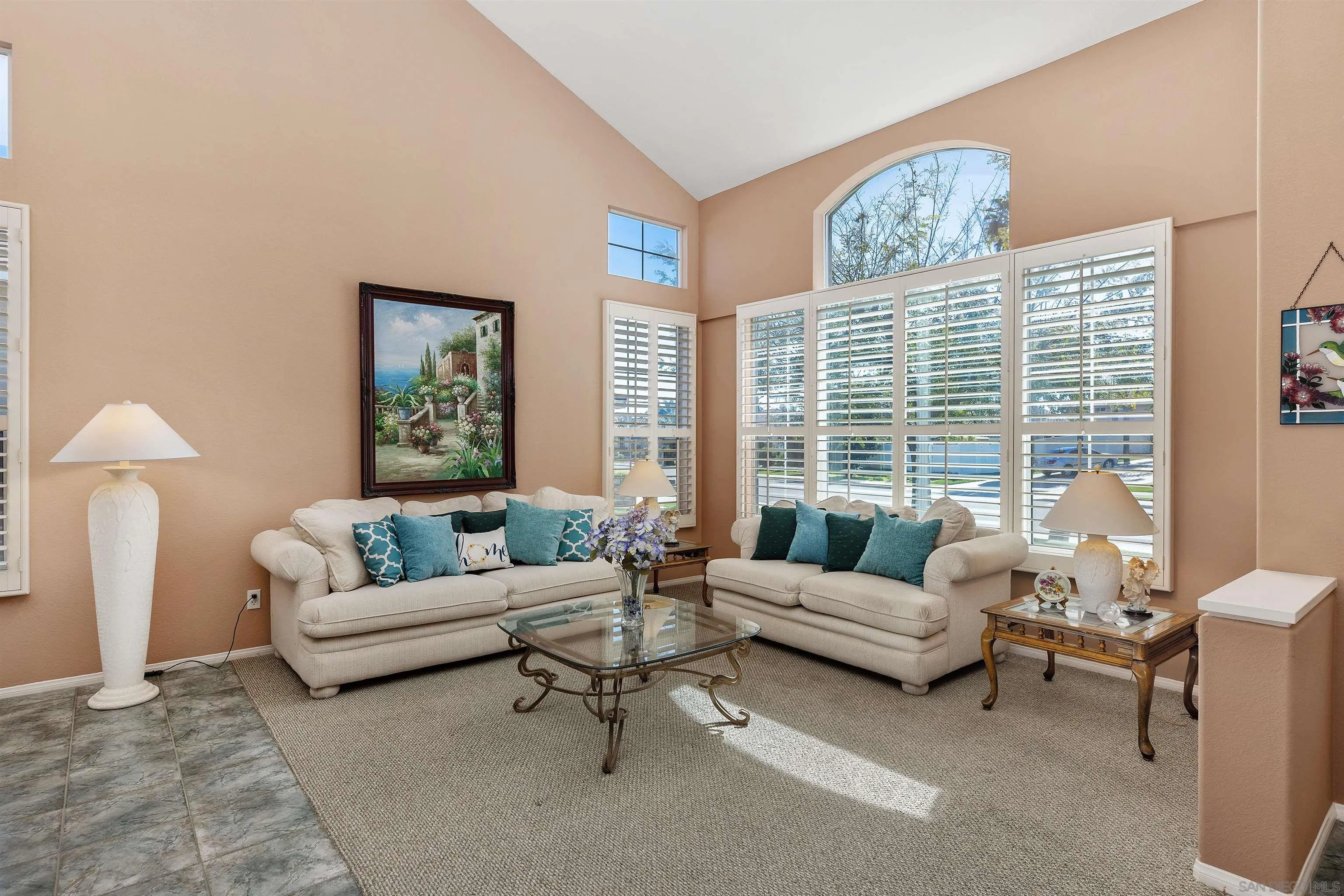 5213 Palmera Drive Oceanside, CA 92056 - Photo 9 of 38 a living room with furniture and a large window