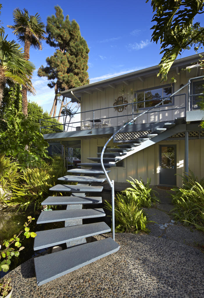 3246 Beach Club Road Carpinteria, CA 93013 - Photo 2 of 7 a front view of a house with a yard