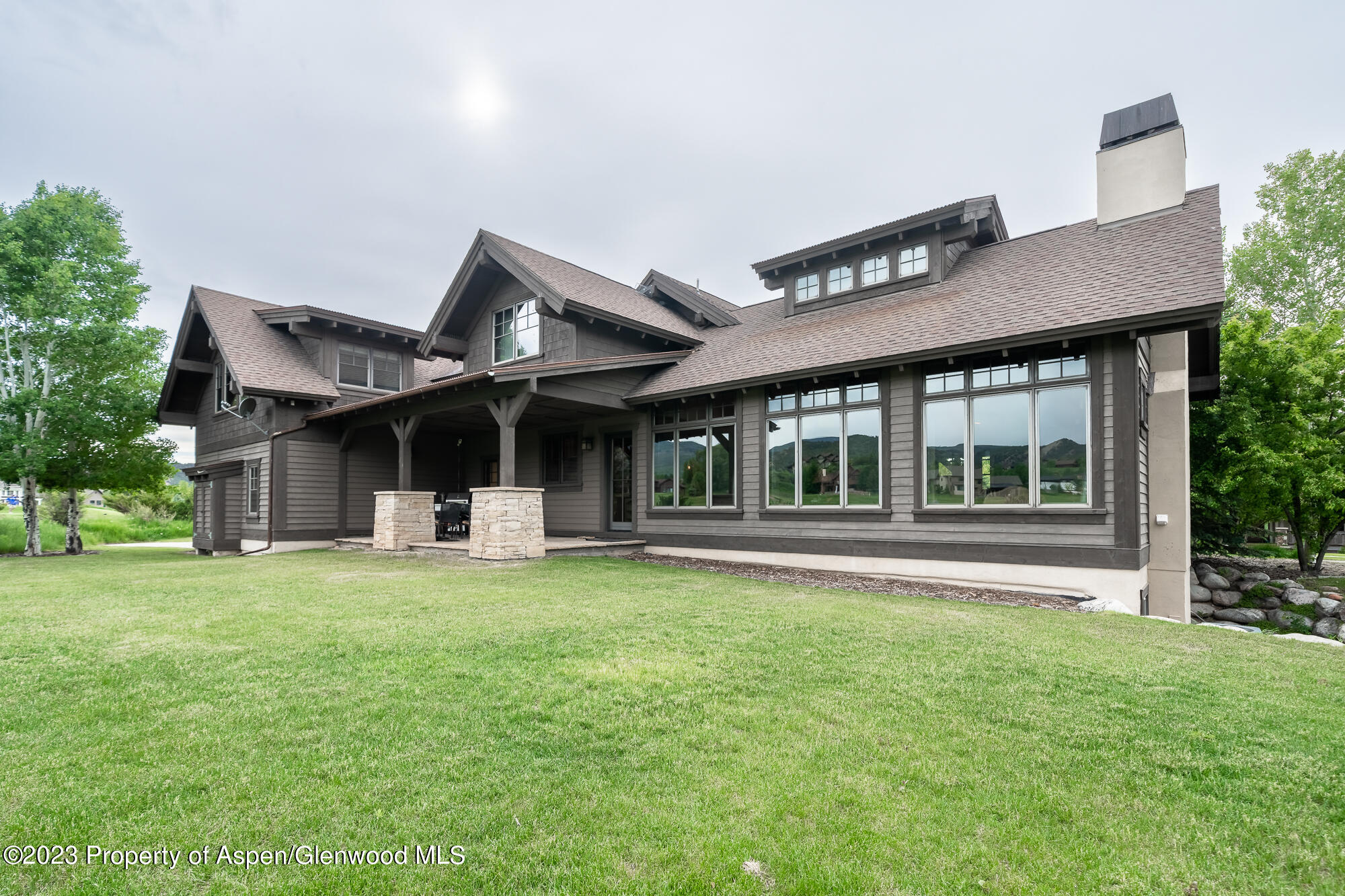 front view of a house with a garden