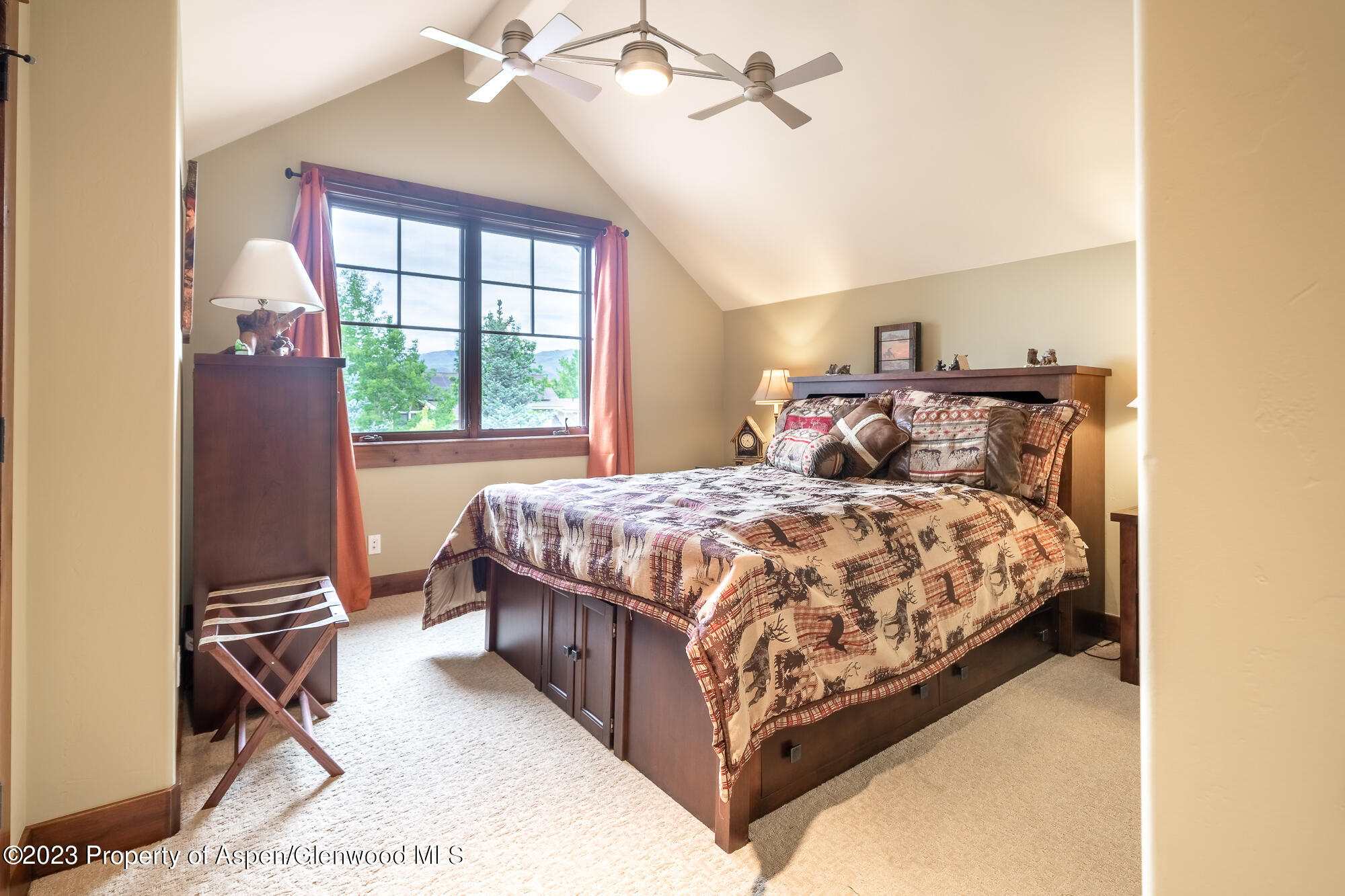 1720 Eagle Ranch Road Eagle, CO 81631 - Photo 14 of 18 a bedroom with a large bed and a window