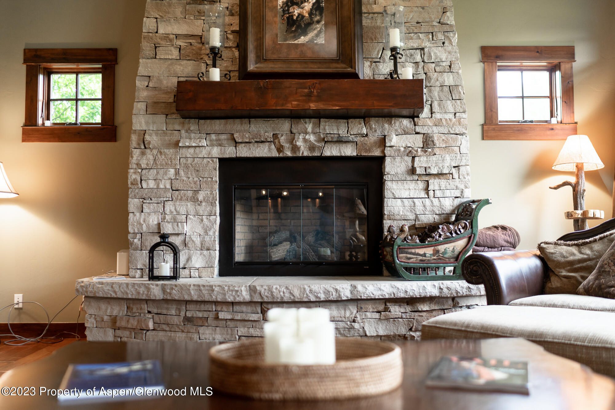 1720 Eagle Ranch Road Eagle, CO 81631 - Photo 4 of 18 a living room with furniture and a fireplace