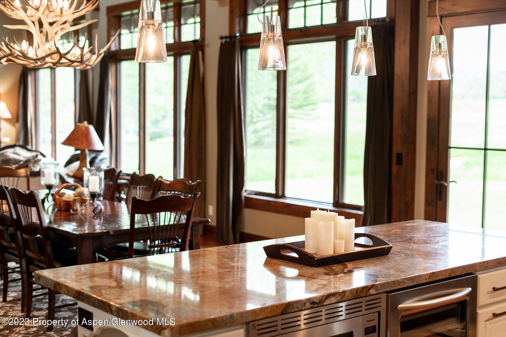 1720 Eagle Ranch Road Eagle, CO 81631 - Photo 8 of 18 a dining room with table and chairs