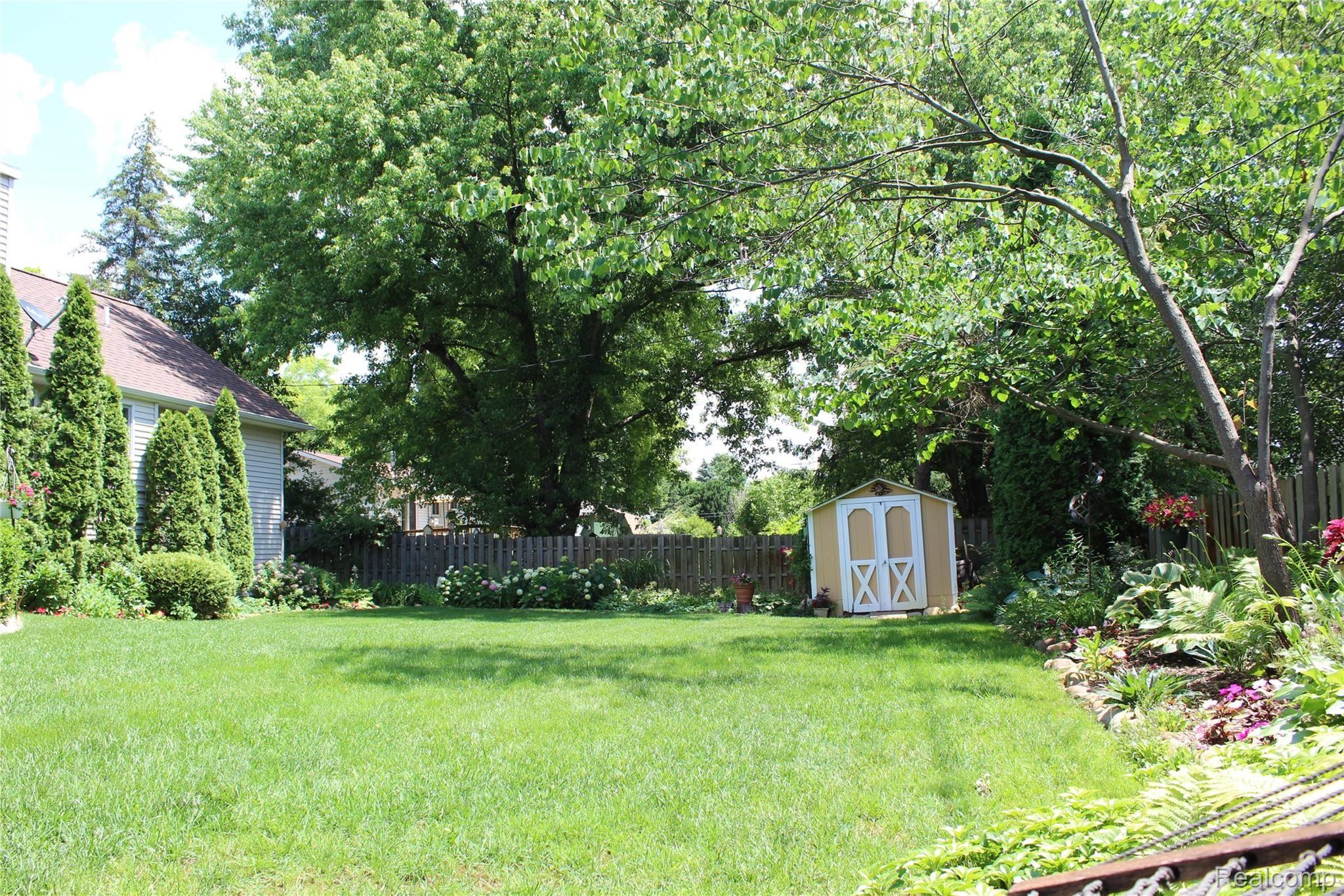 2670 East Wardlow Road Highland, MI 48356 - Photo 60 of 99 backyard view