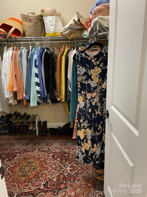 515 Bowline Drive Denver, NC 28037 - Photo 22 of 26 a view of walk in closet with clothes and shoes