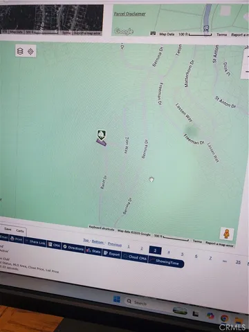 a view of a street with a yard