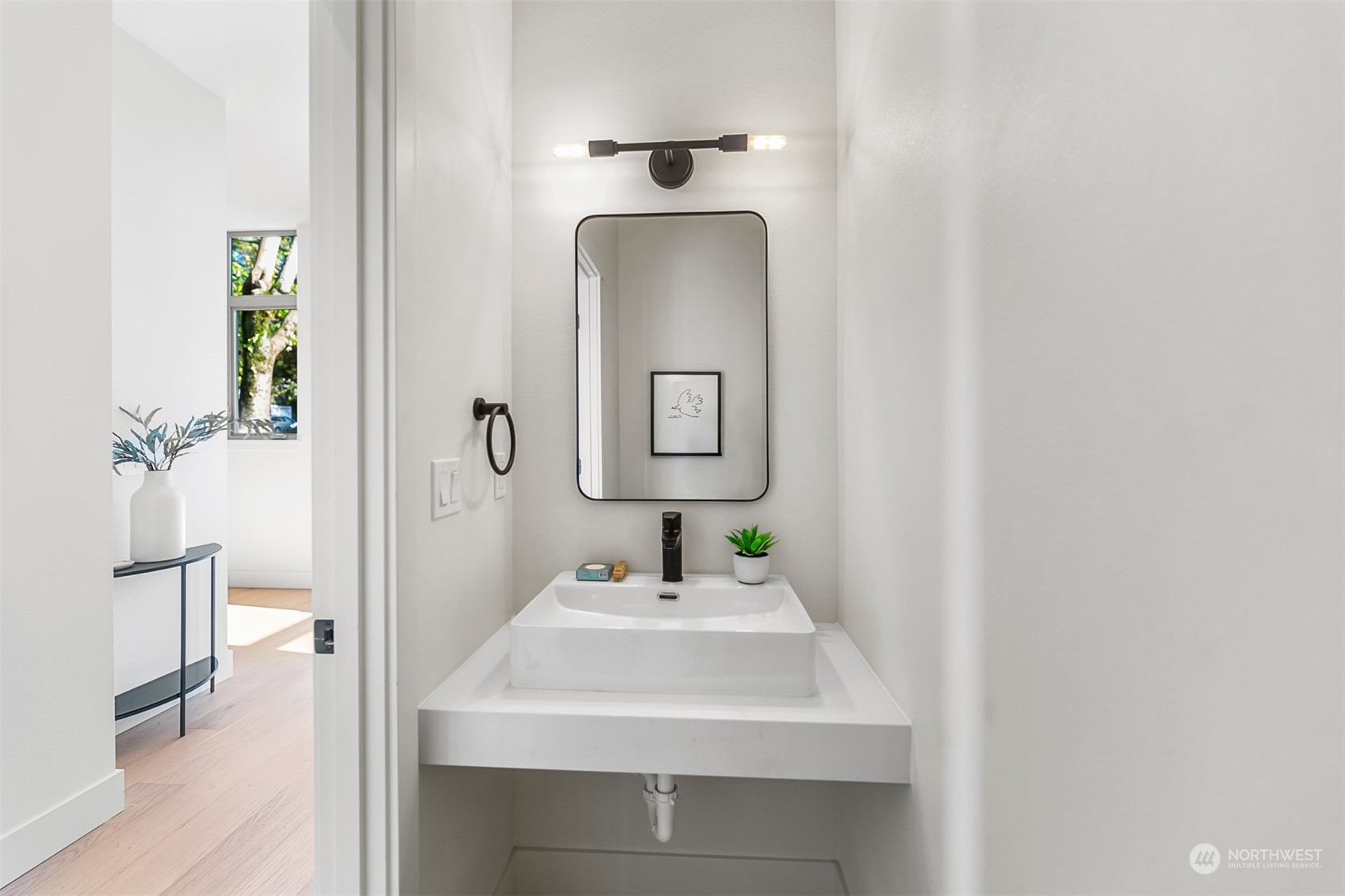 3207 37th Place South Seattle, WA 98144 - Photo 12 of 38 a bathroom with a sink and a mirror